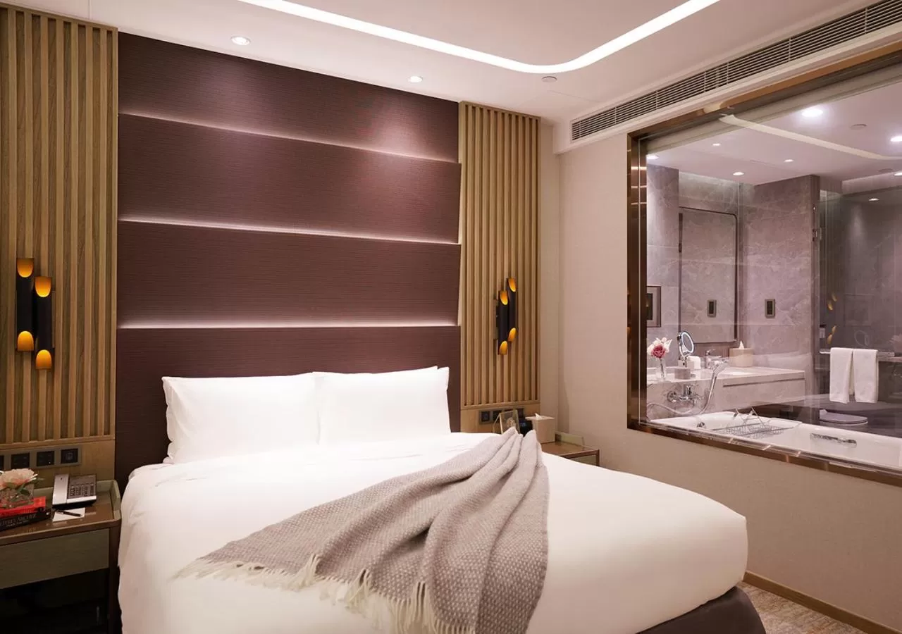 Bed in One-Eight-One Hotel & Serviced Residences