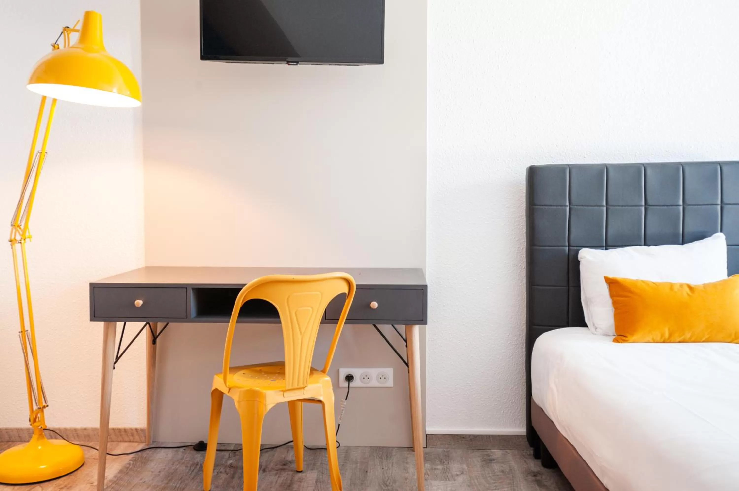 Seating area in La Maison Hôtel Mulhouse Centre