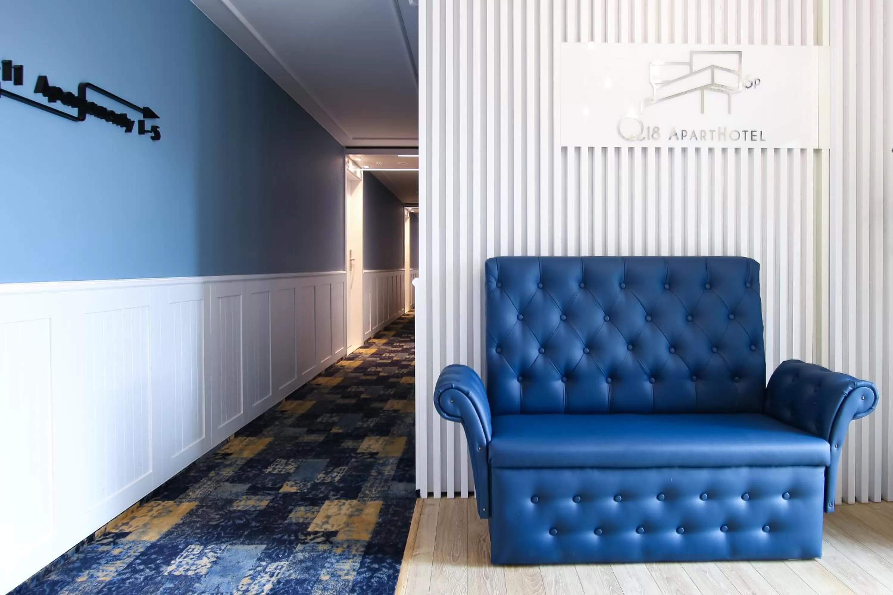 Living room in Q18 ApartHotel