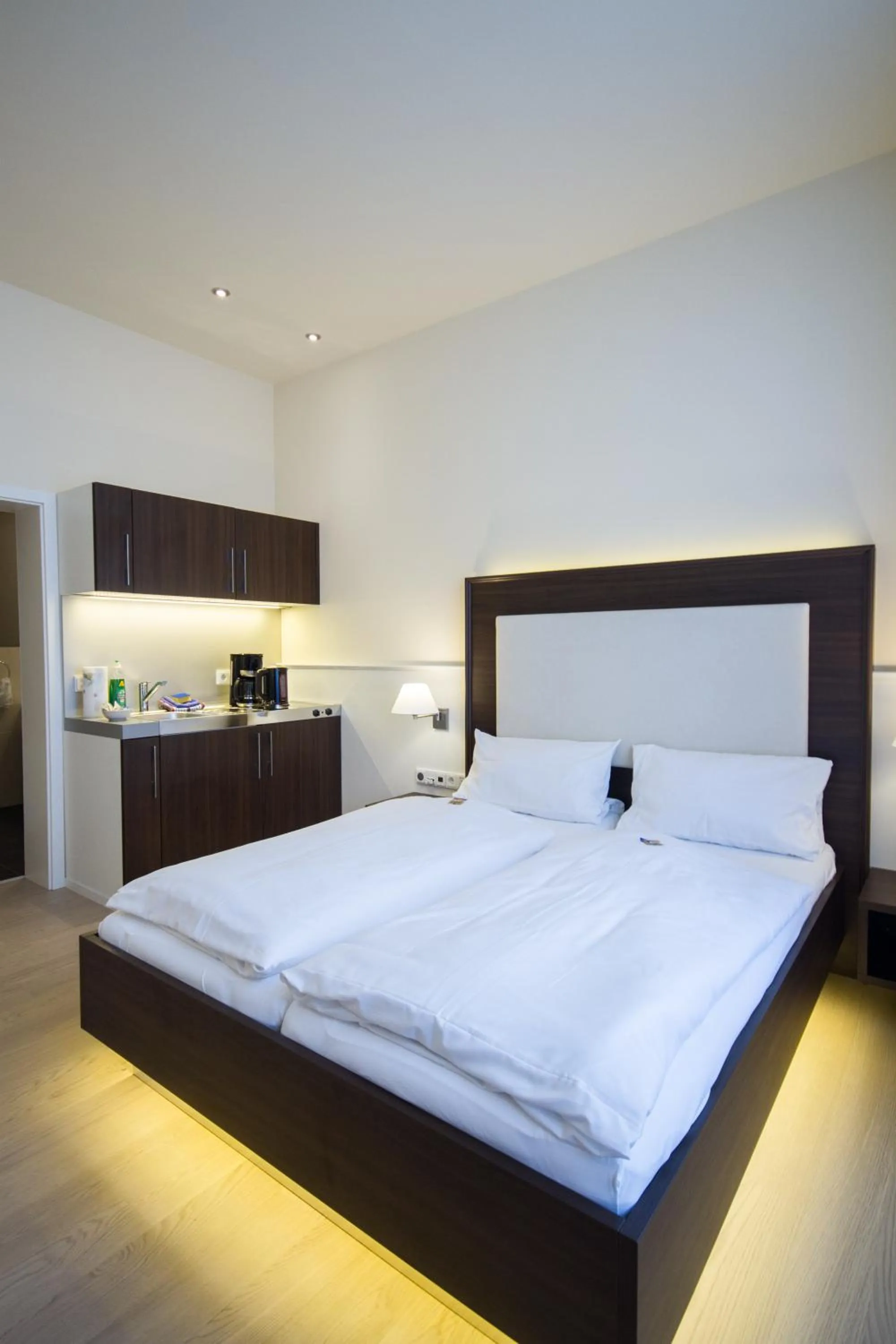 Bed in The Heidelberg Exzellenz Hotel