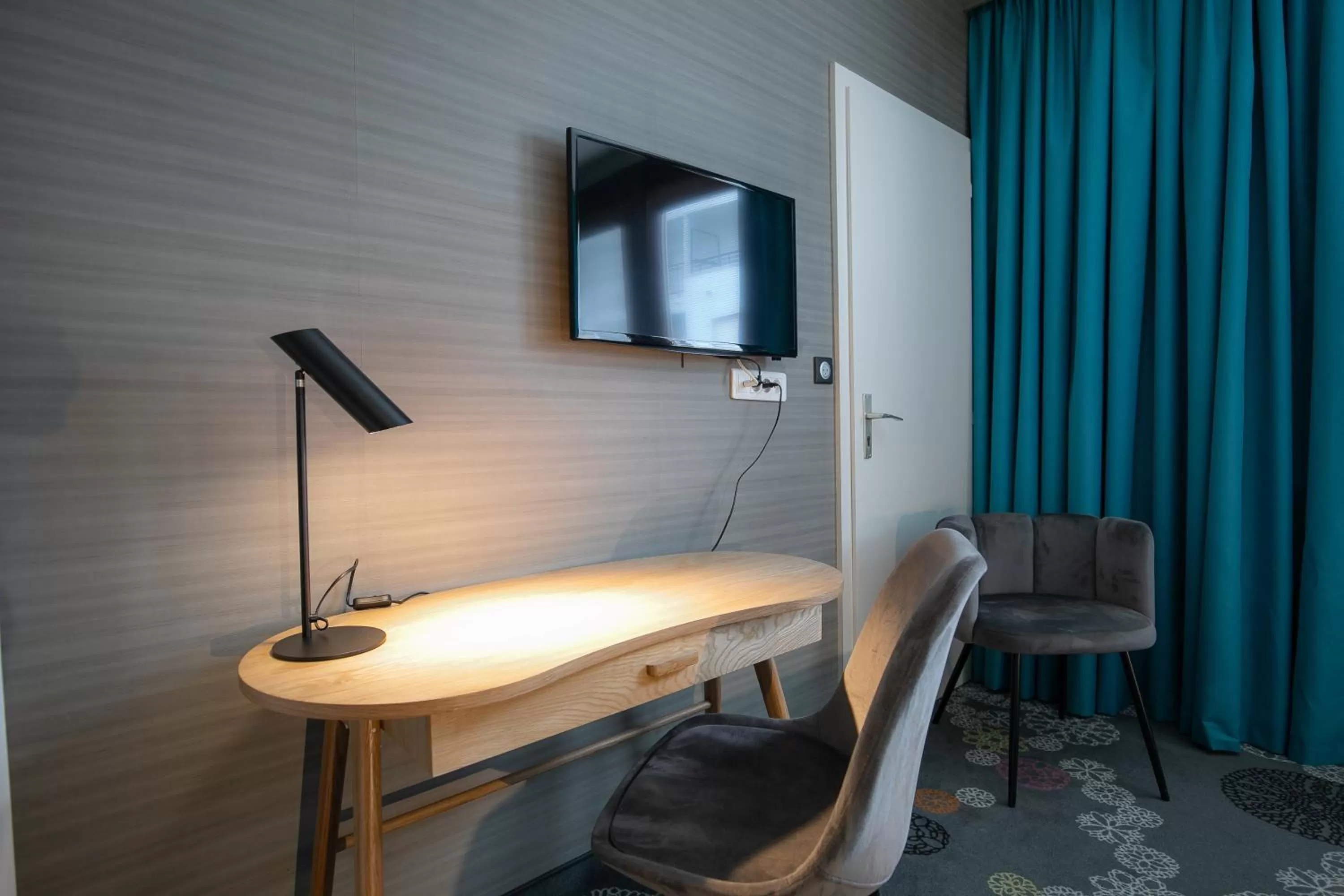 Seating area in Hôtel Restaurant Vaillant Colmar Nord