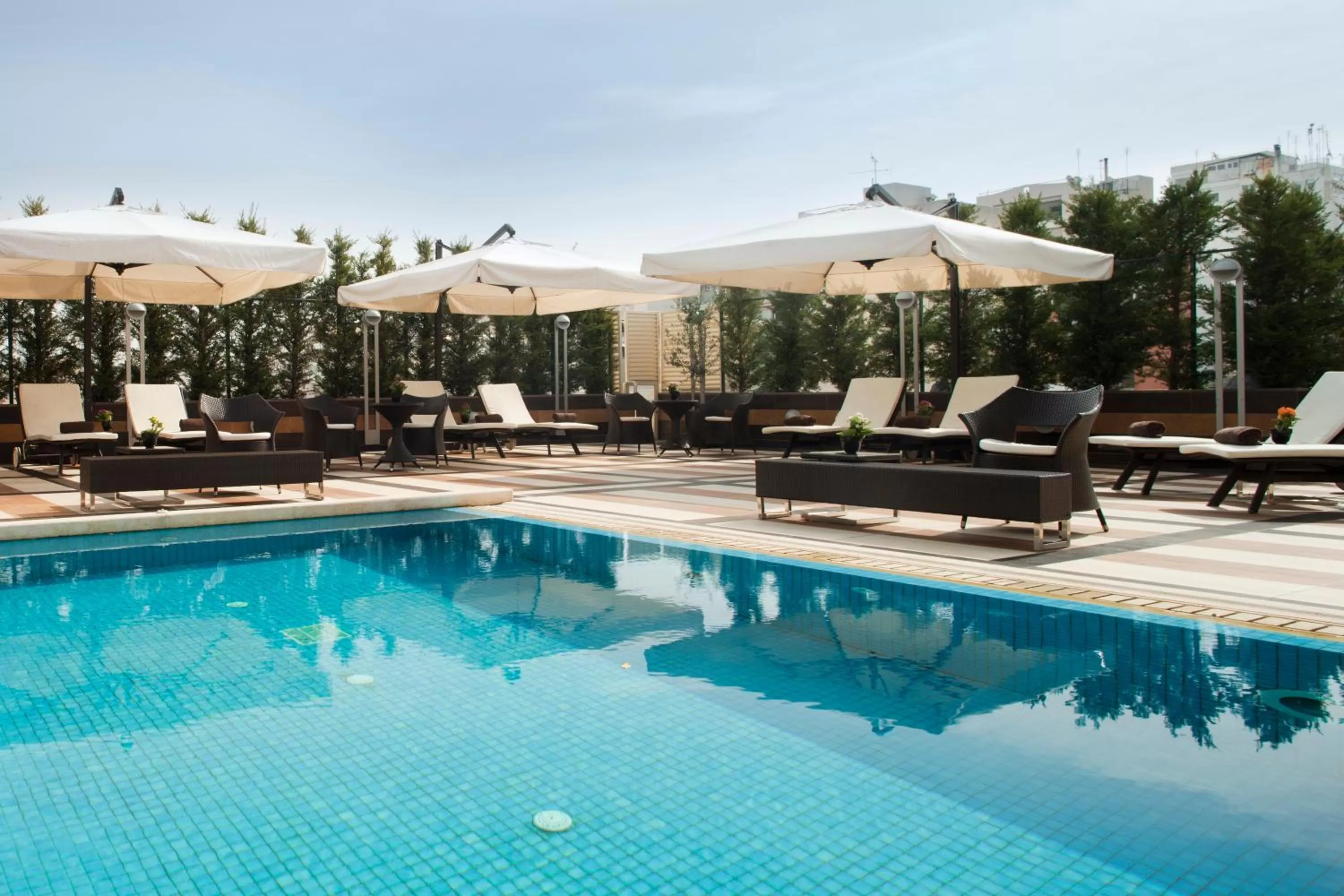 Swimming pool in Crowne Plaza Athens City Centre by IHG