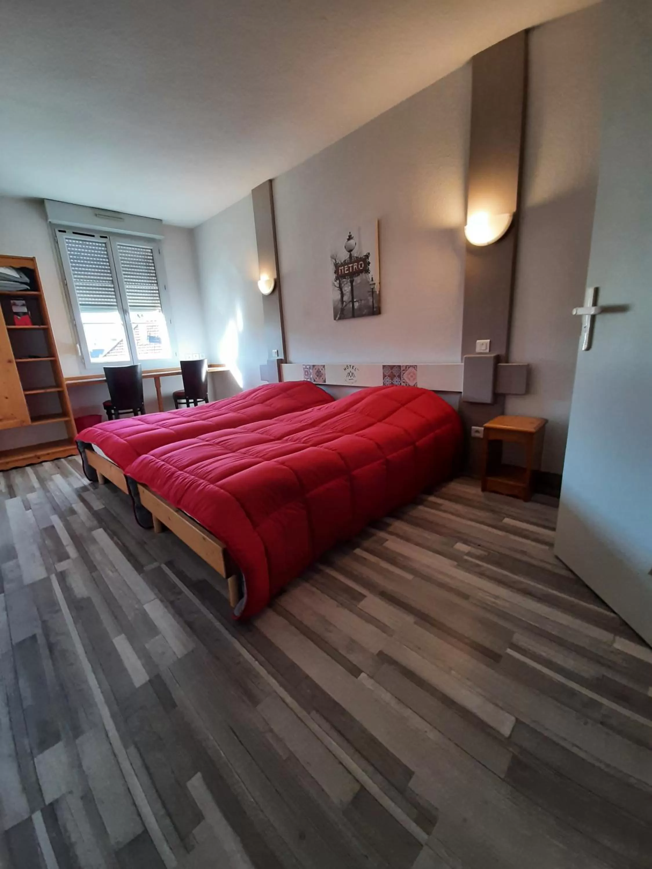 Bed in Hôtel de La Vallée