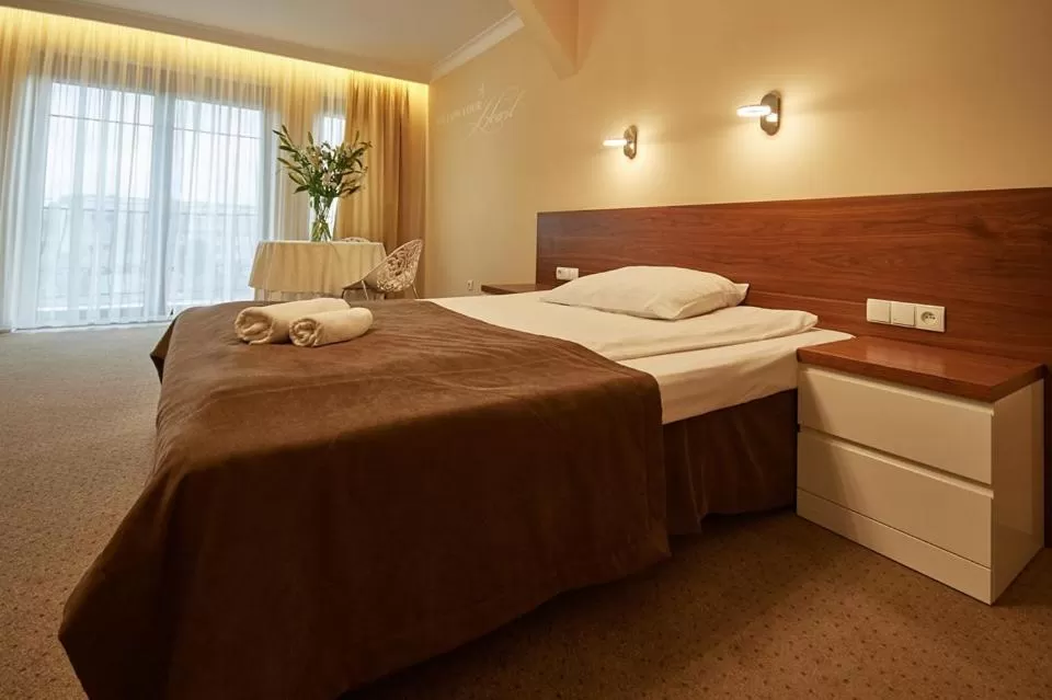 Bed in Hotel Melodia ***