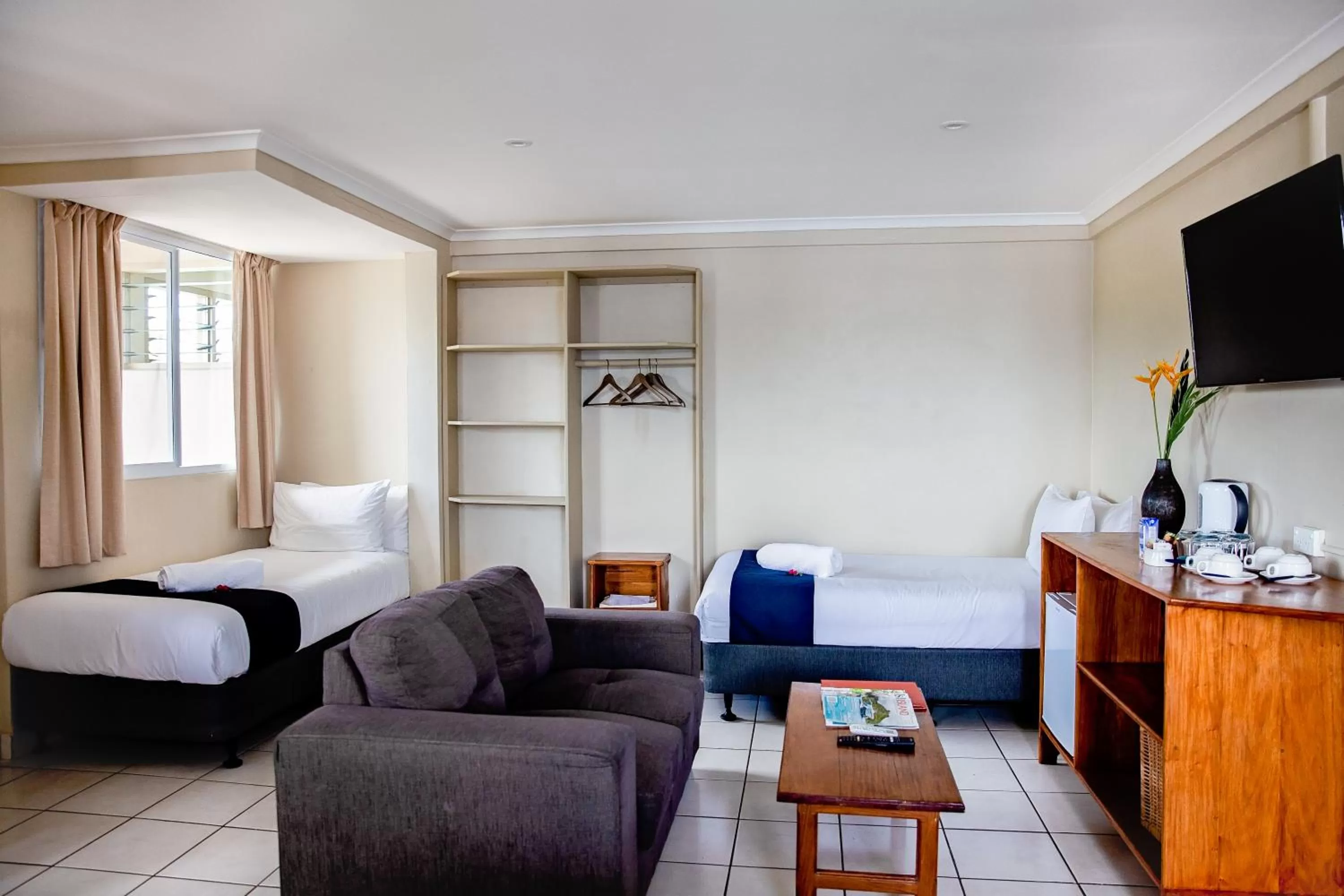 Photo of the whole room, Bed in The Espiritu