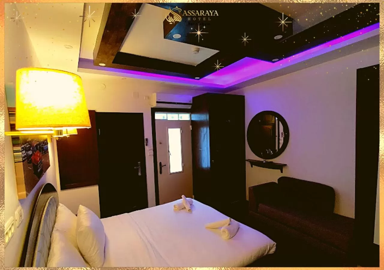 Bed in Assaraya Palace Hotel