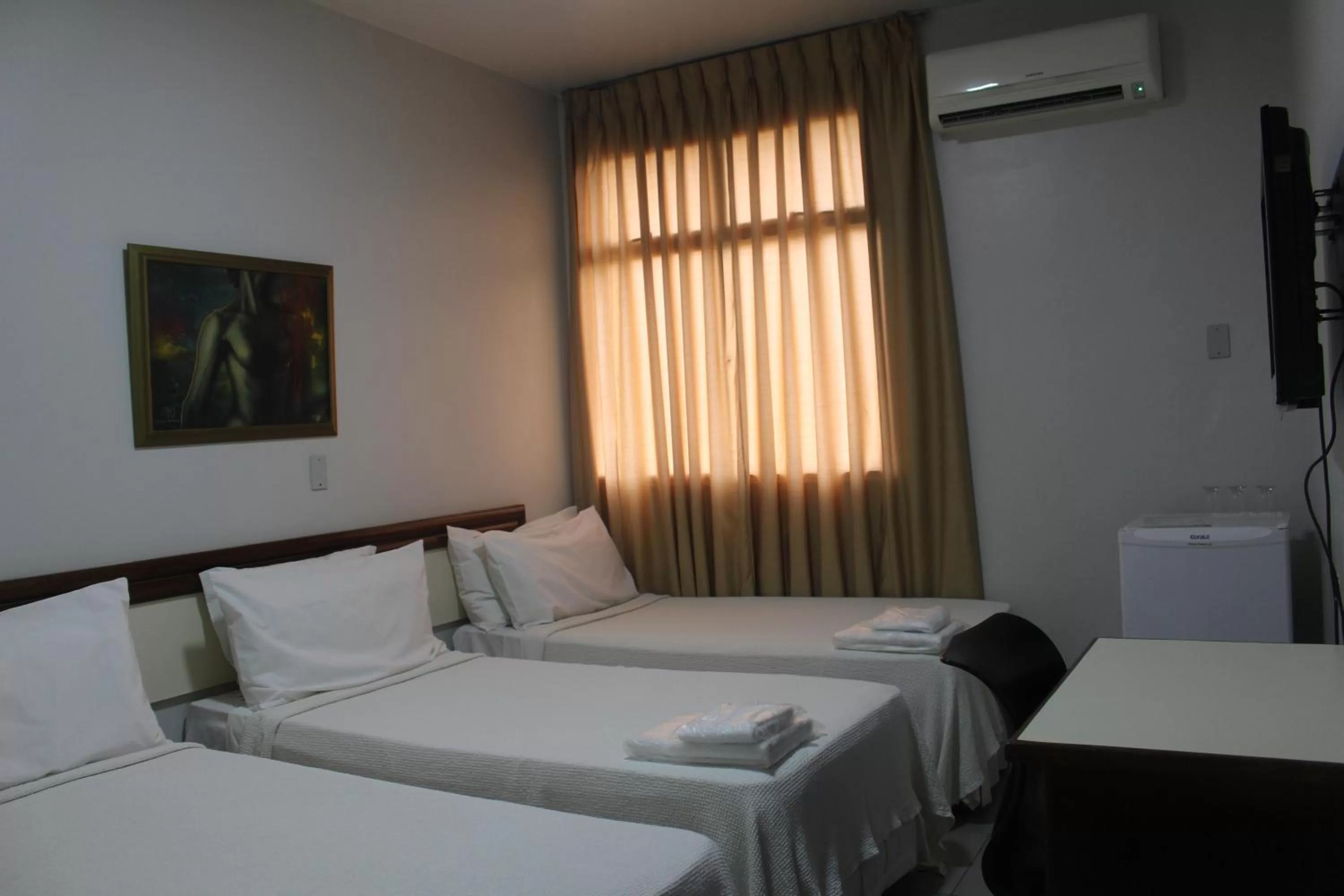 Bed in Hotel Oscar Econômico