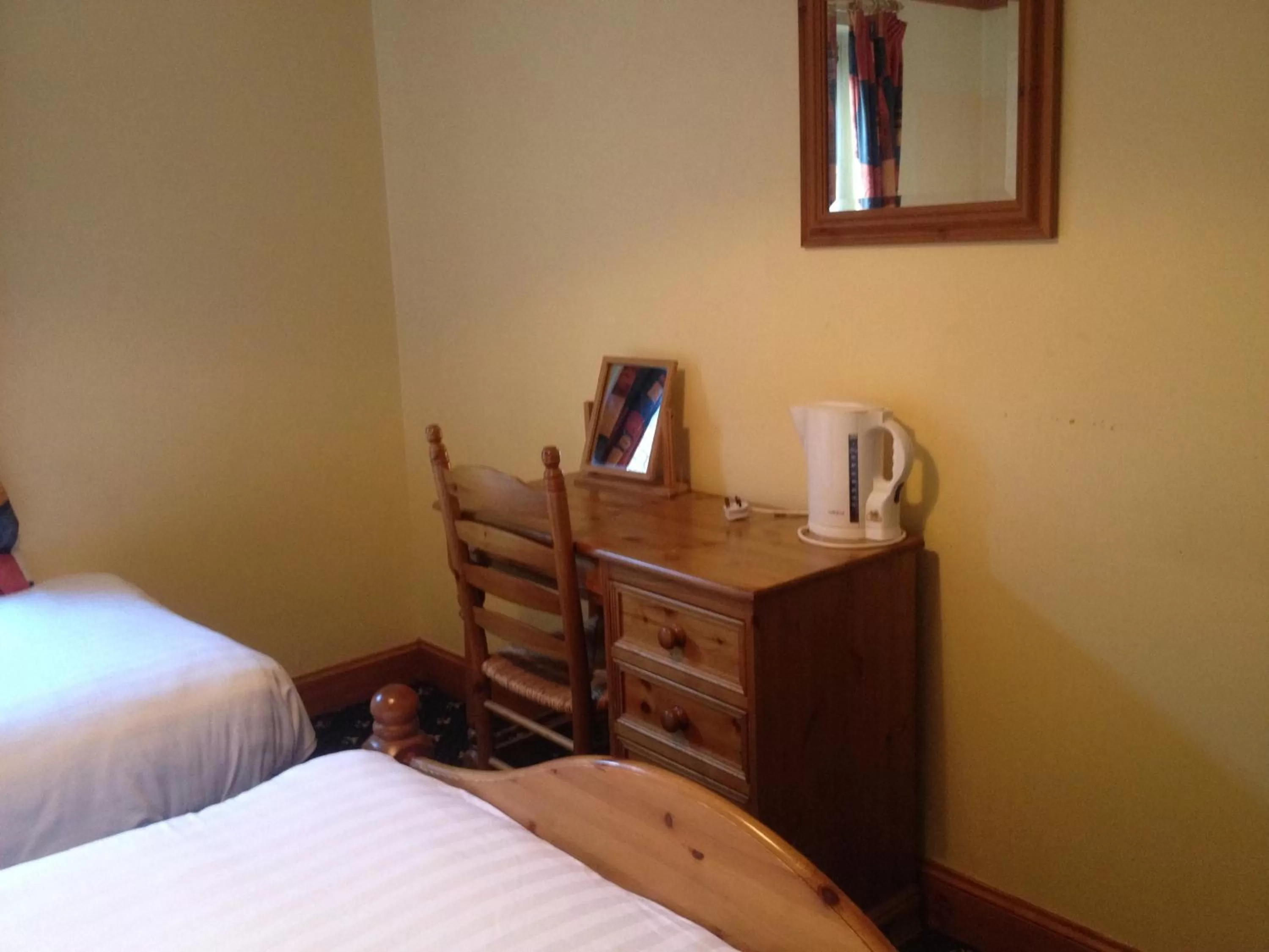 Decorative detail, Bed in Twin Lions Hotel