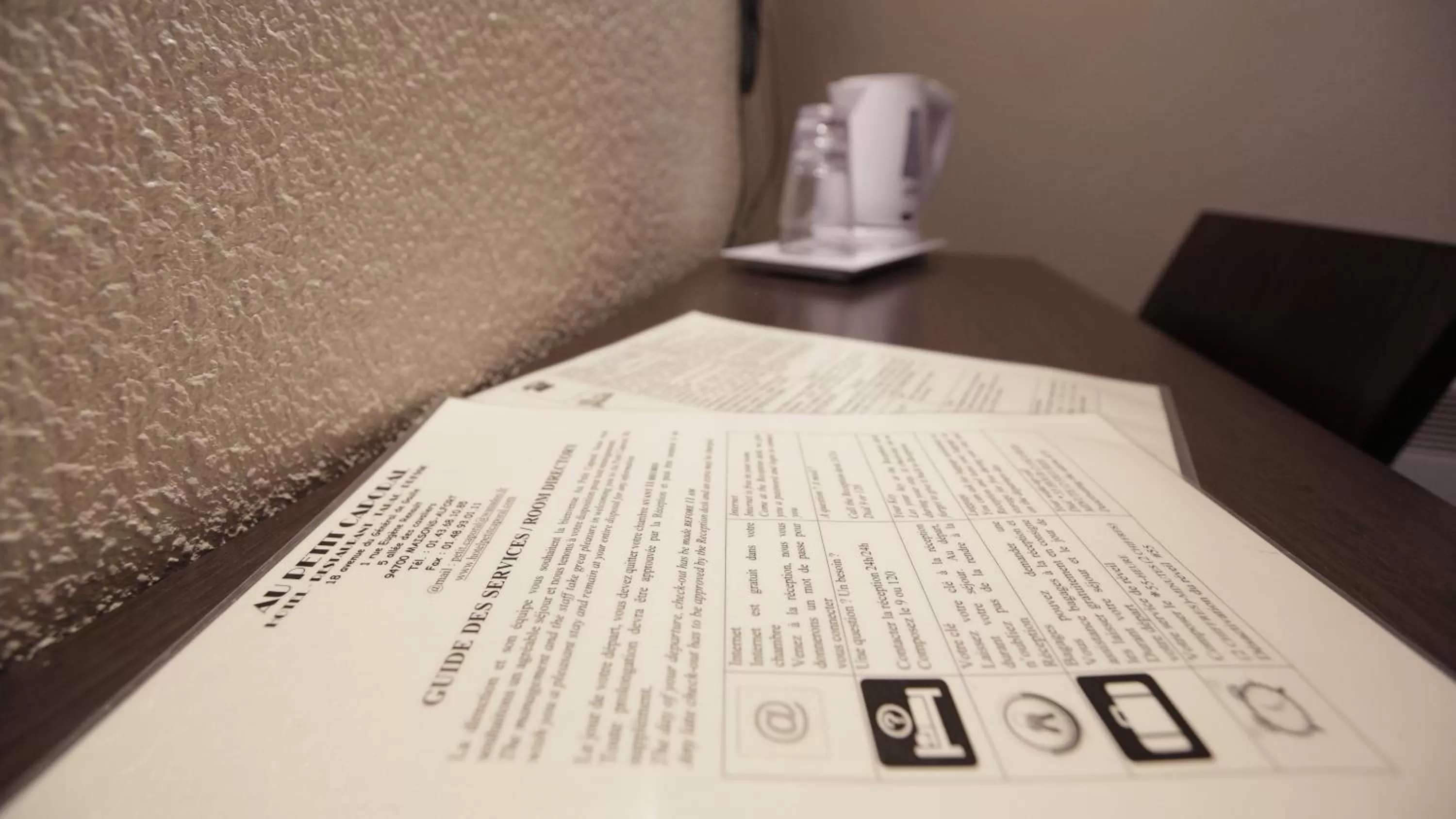 Bedroom in Hôtel Au Petit Caporal