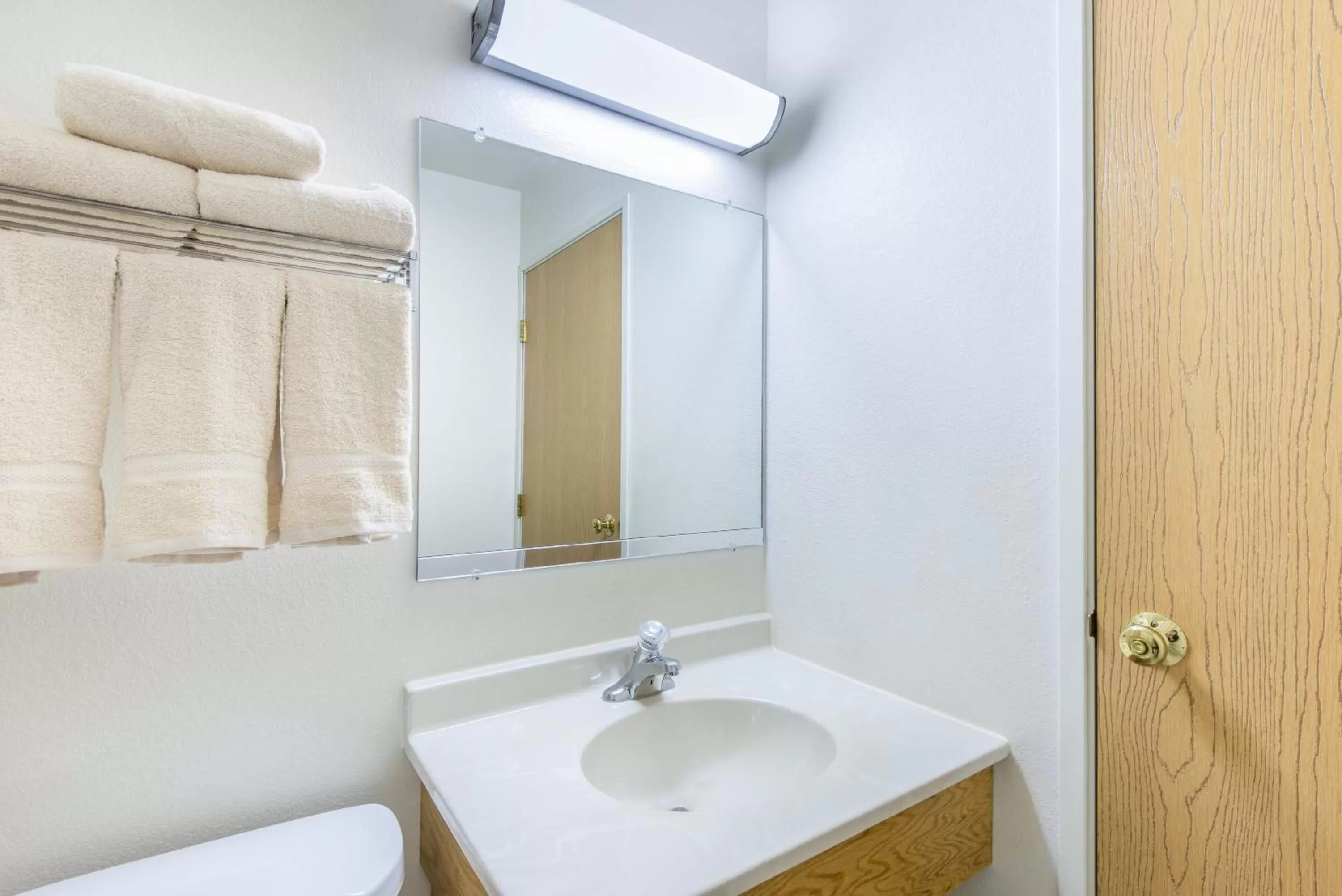 Bathroom in Super 8 by Wyndham West Middlesex/Sharon Area