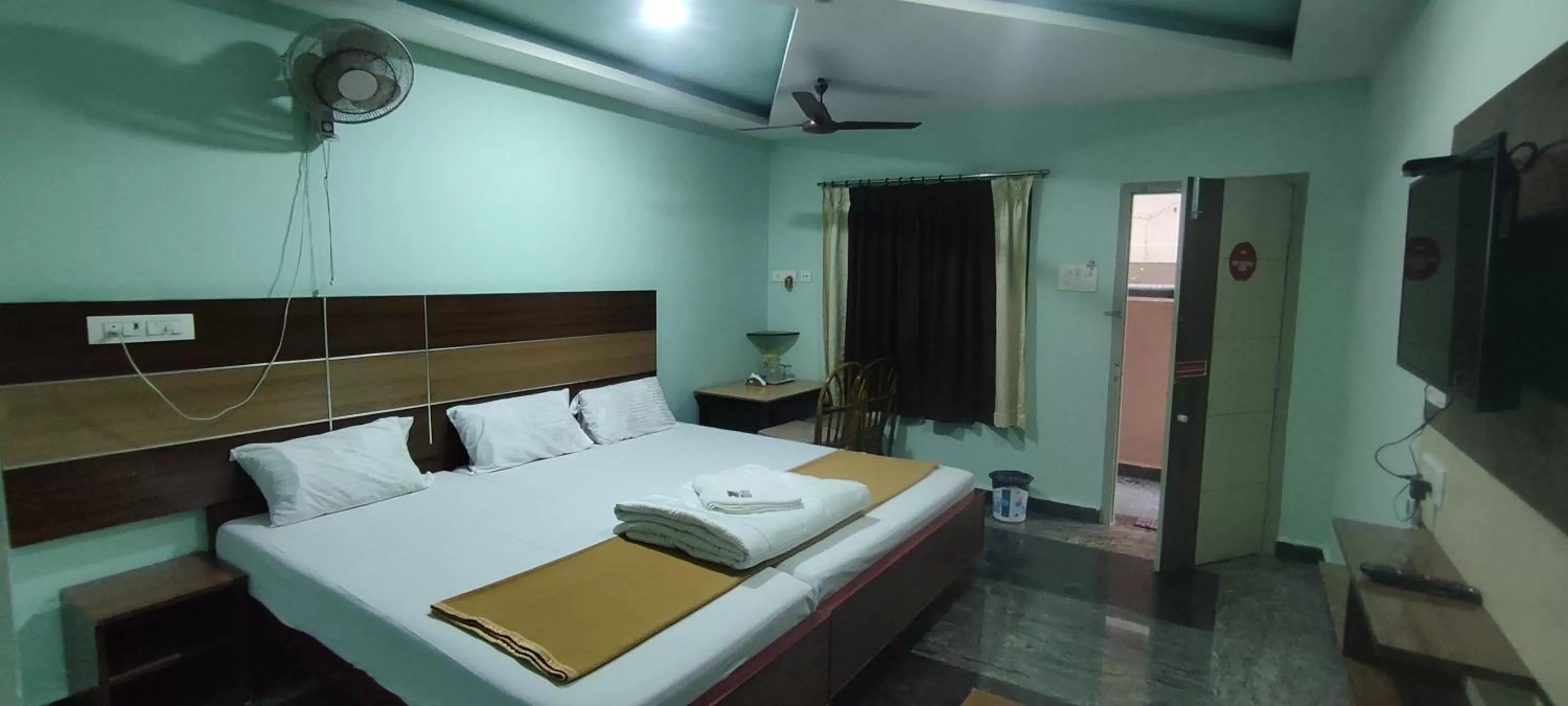 Bed in Sri Murugan Beach Paradise Hotel