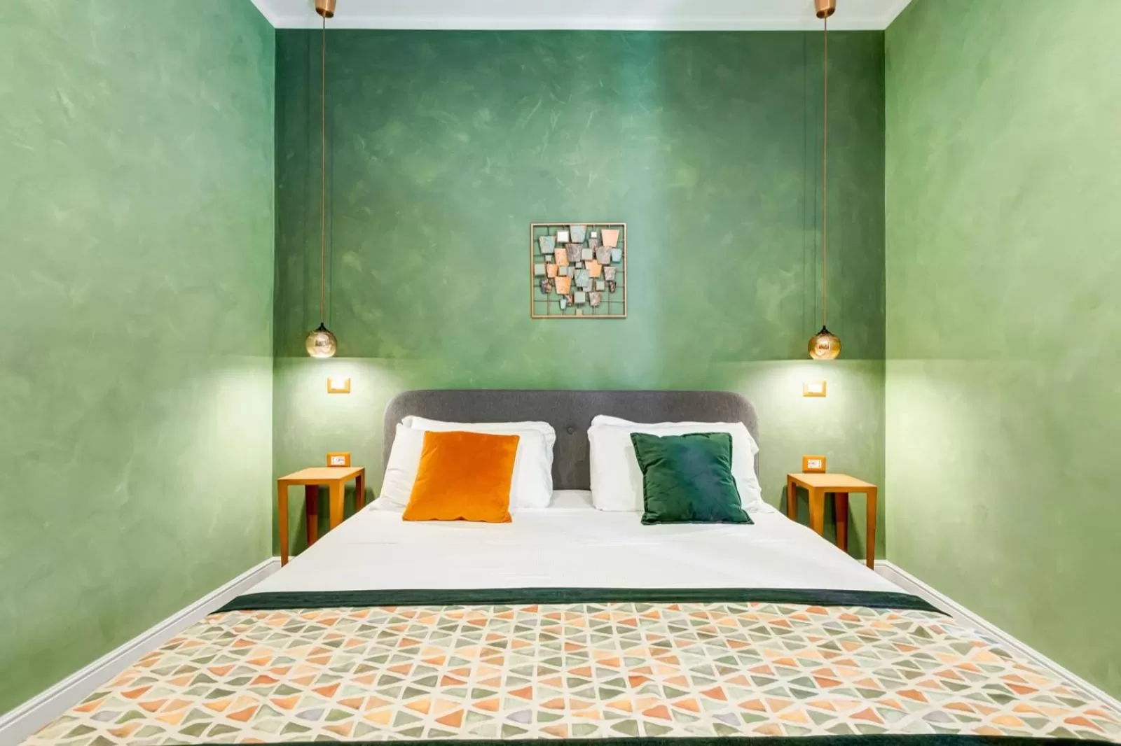 Bed in Ripetta Deluxe Suites