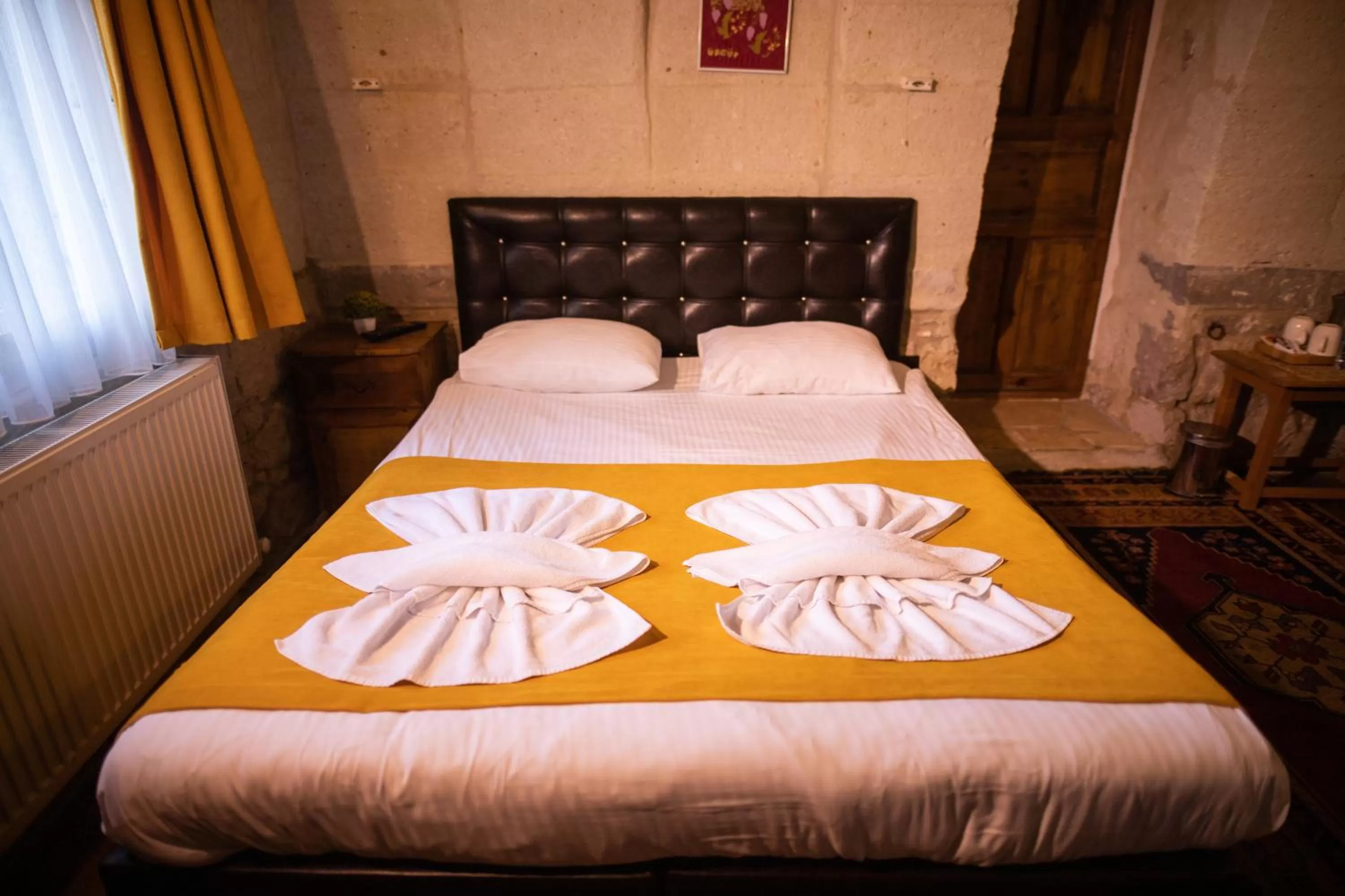 Bed in 7 Oda Kapadokya Cave Hotel
