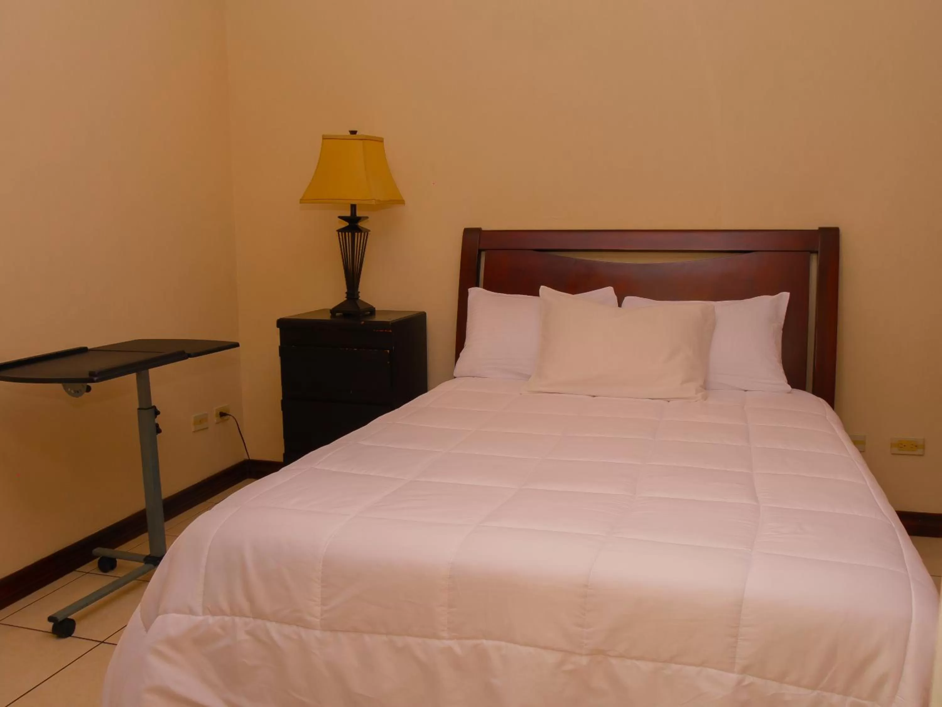 Bed in Hotel Bamboo Aeropuerto