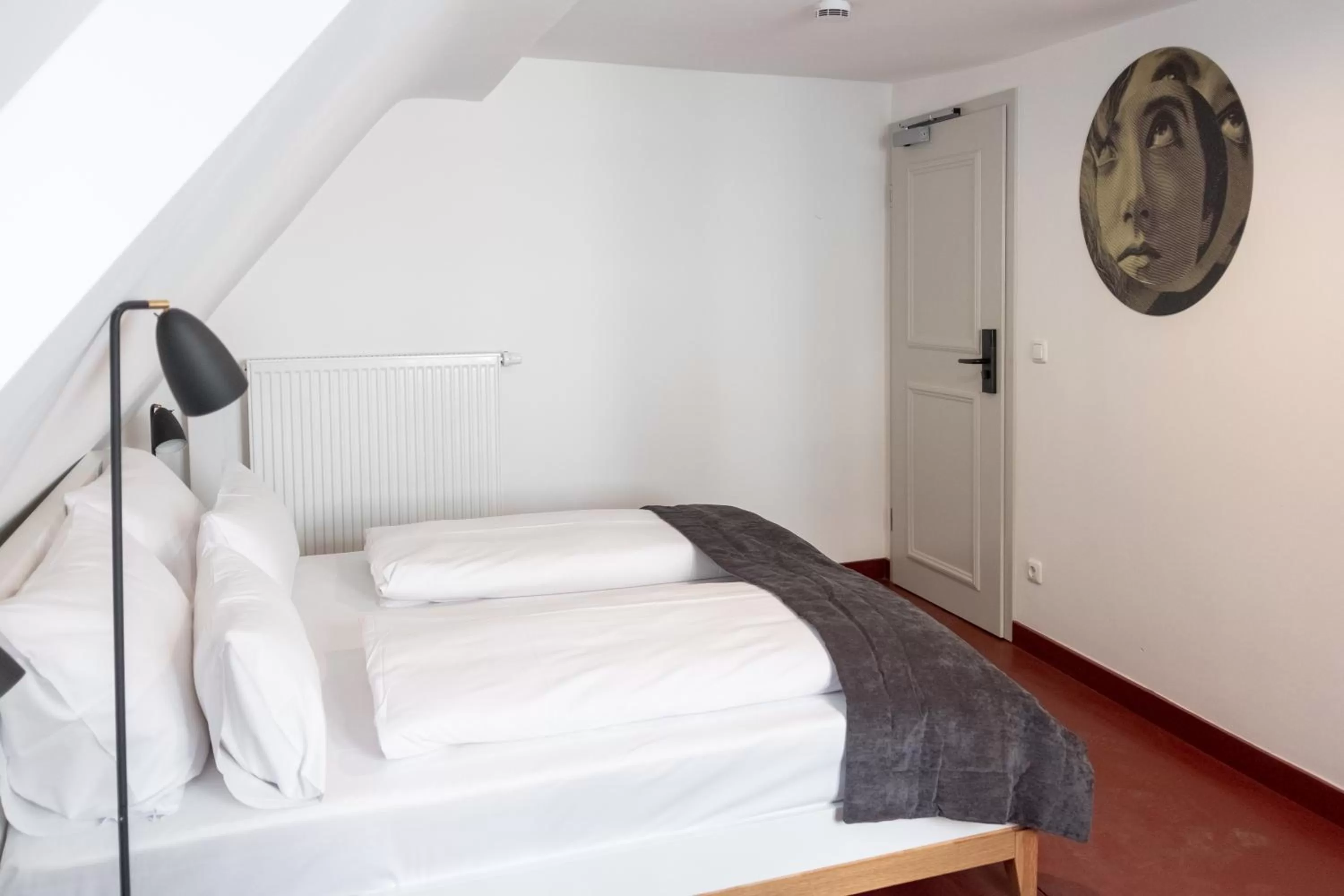 Bed in ANA Living Augsburg City Center by Arthotel ANA - Self-Service-Hotel