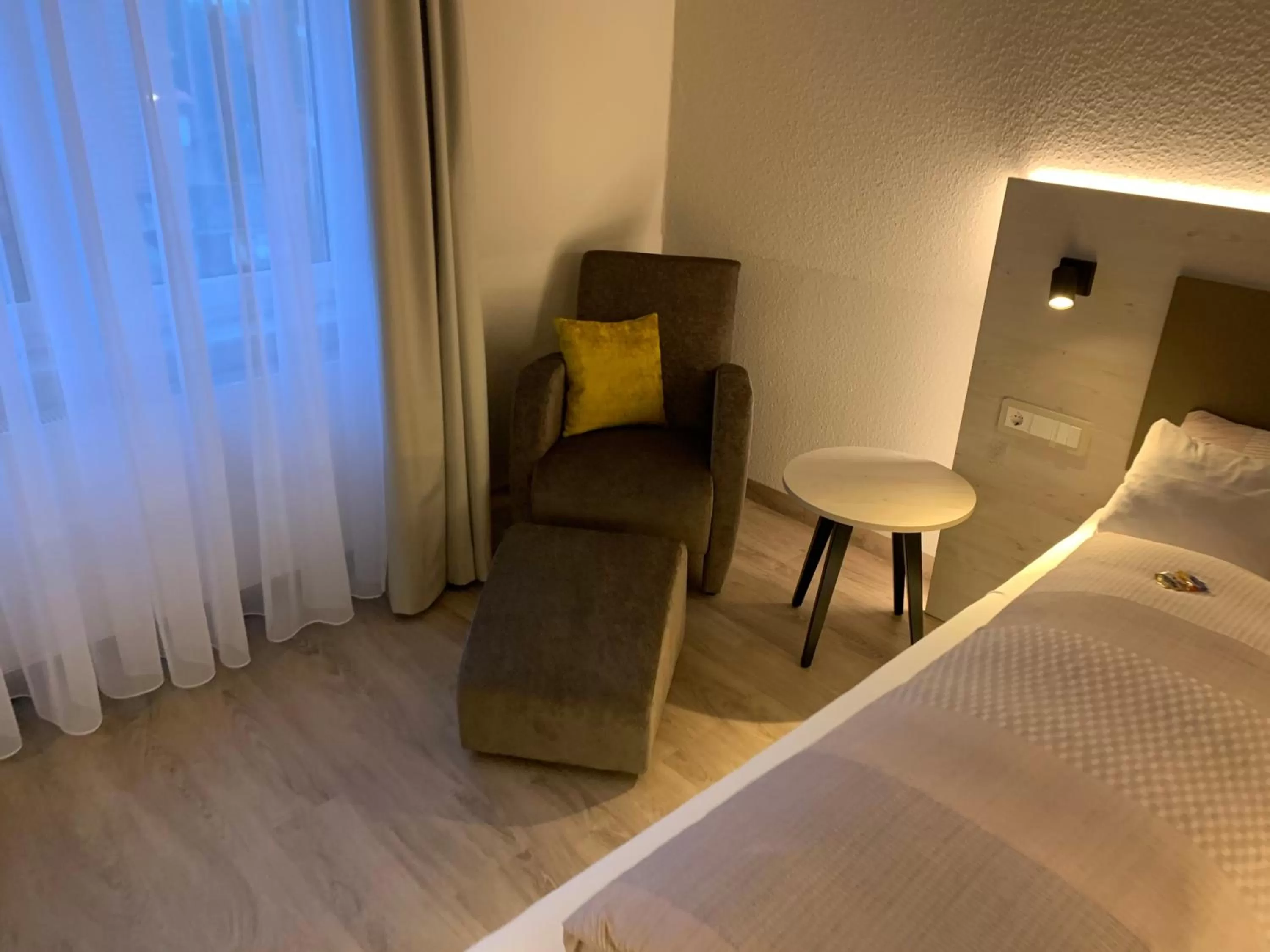 Seating area, Bed in Apart Hotel Norden