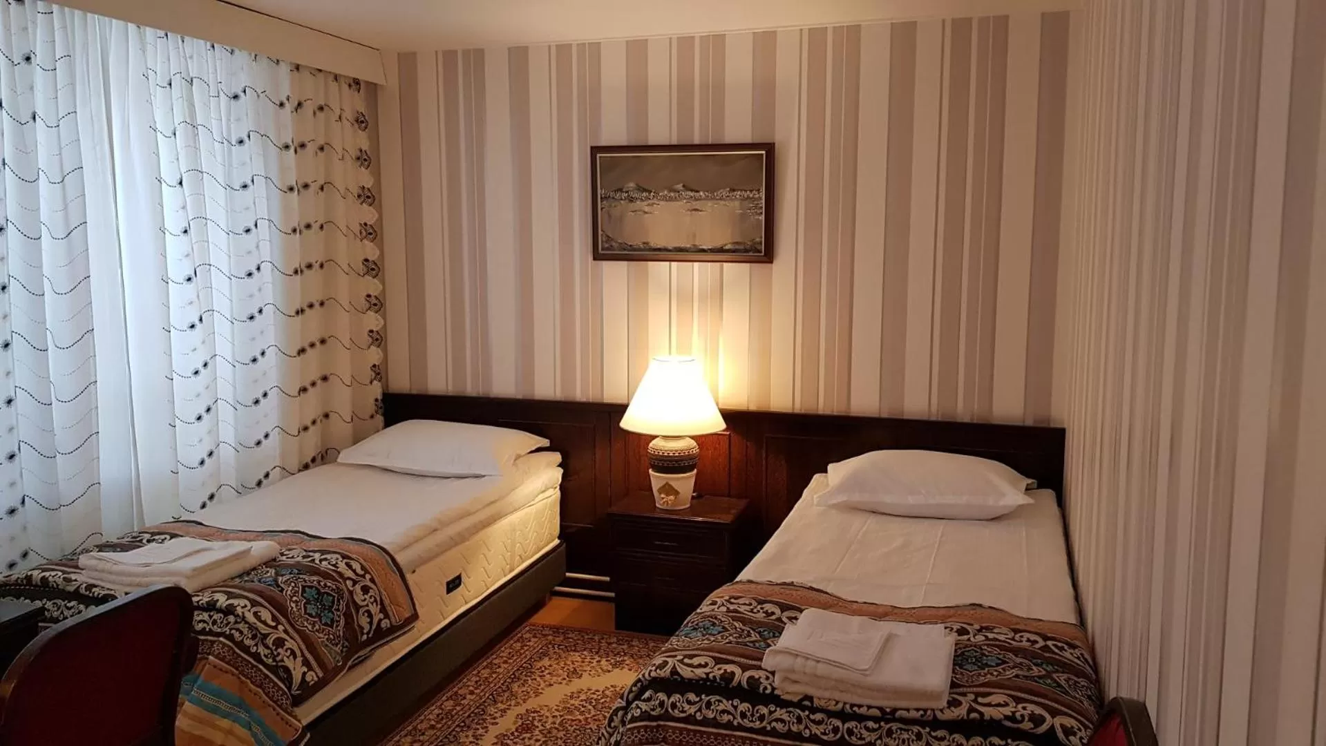 Bed in Hotelli Sandels