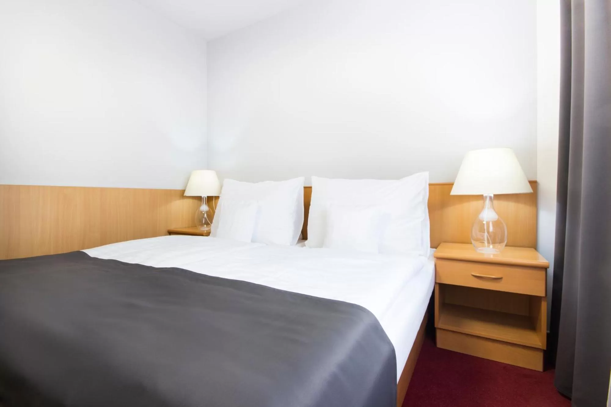 Bed in Hotel Maroli Mikulov