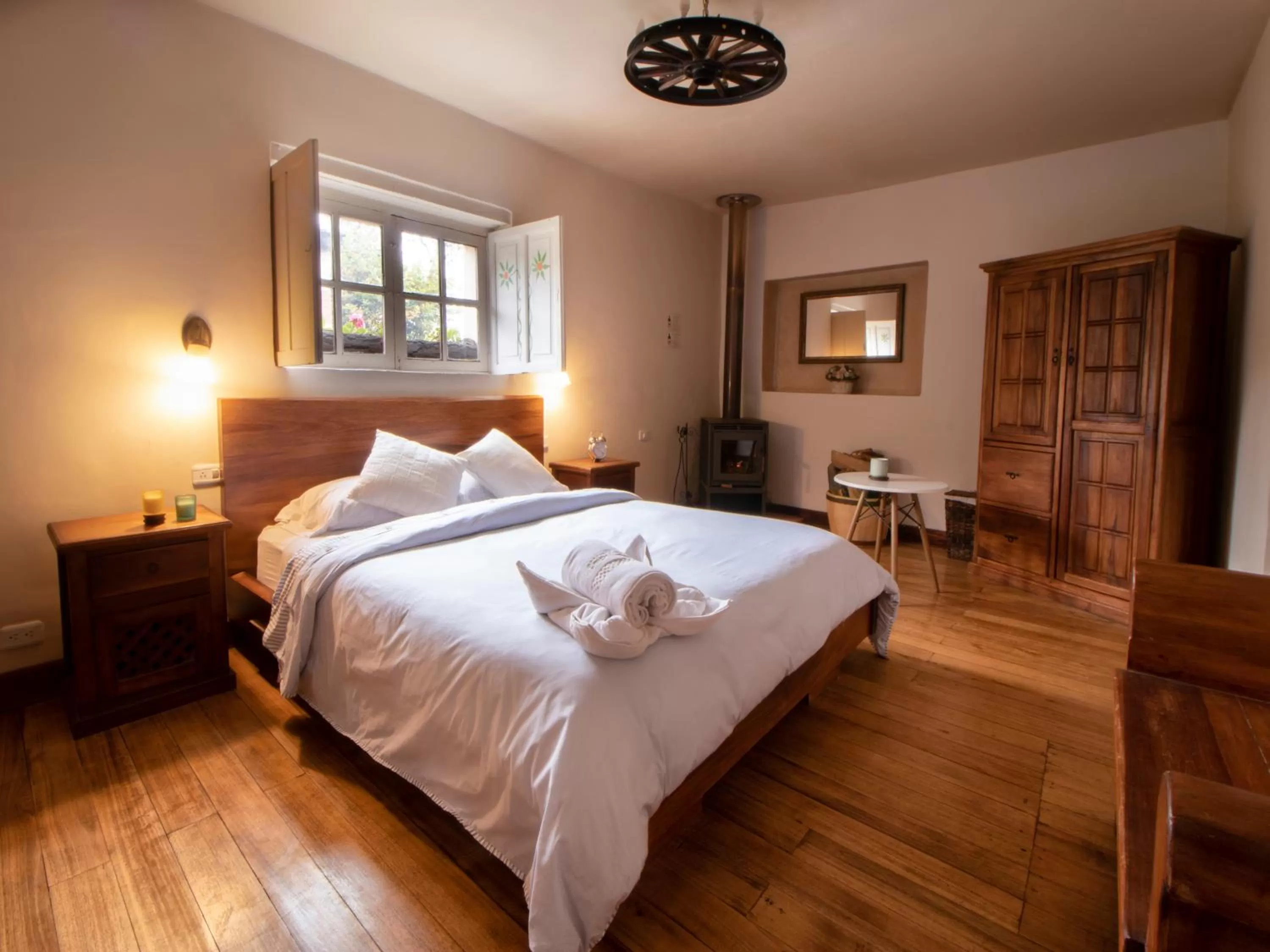 Bed in Hosteria Papagayo Cotopaxi