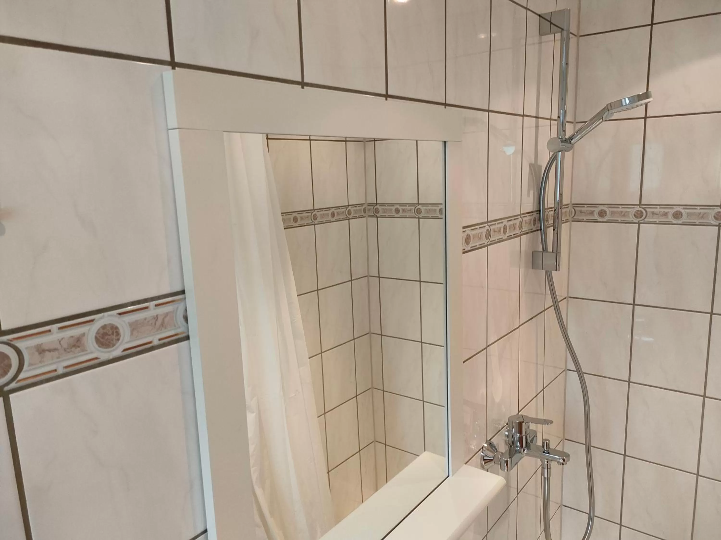 Bathroom in AM BERG Hotel