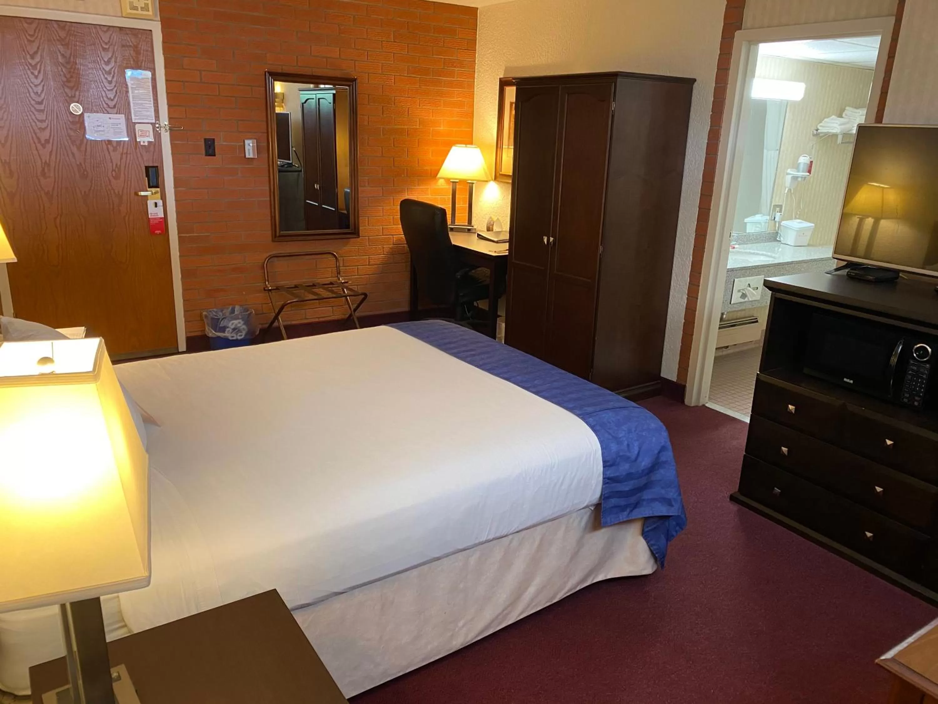 Bed in Ramada by Wyndham Lethbridge