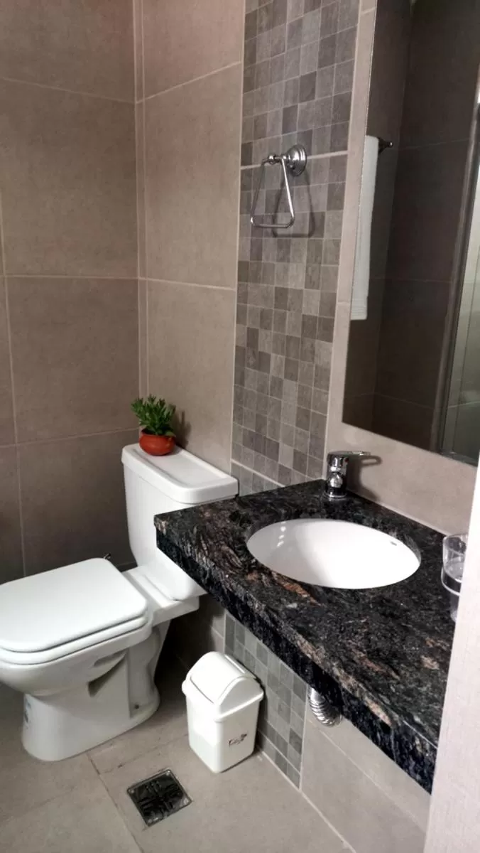 Bathroom in Hotel Musto