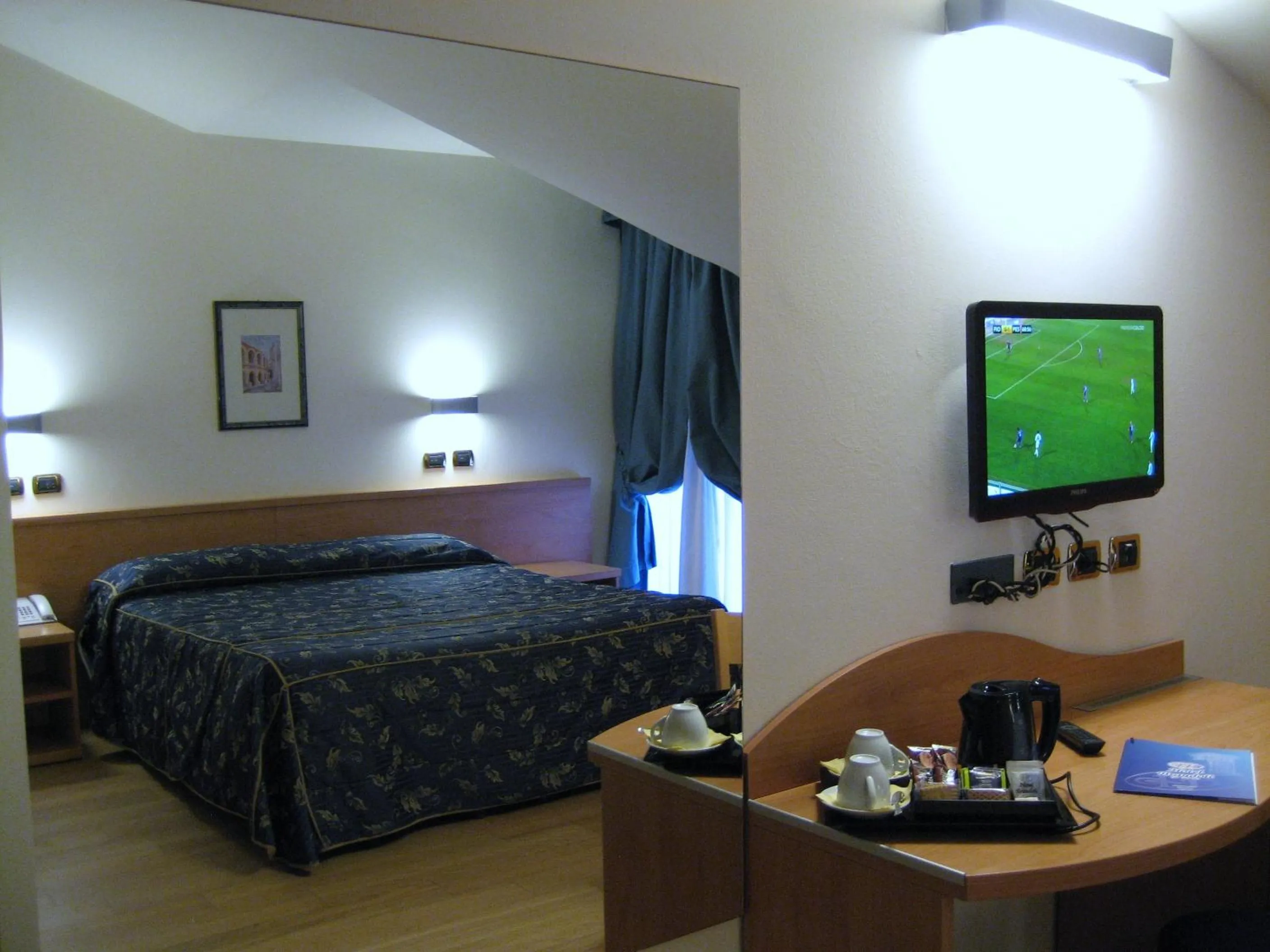 TV and multimedia, Bed in Hotel Brandoli