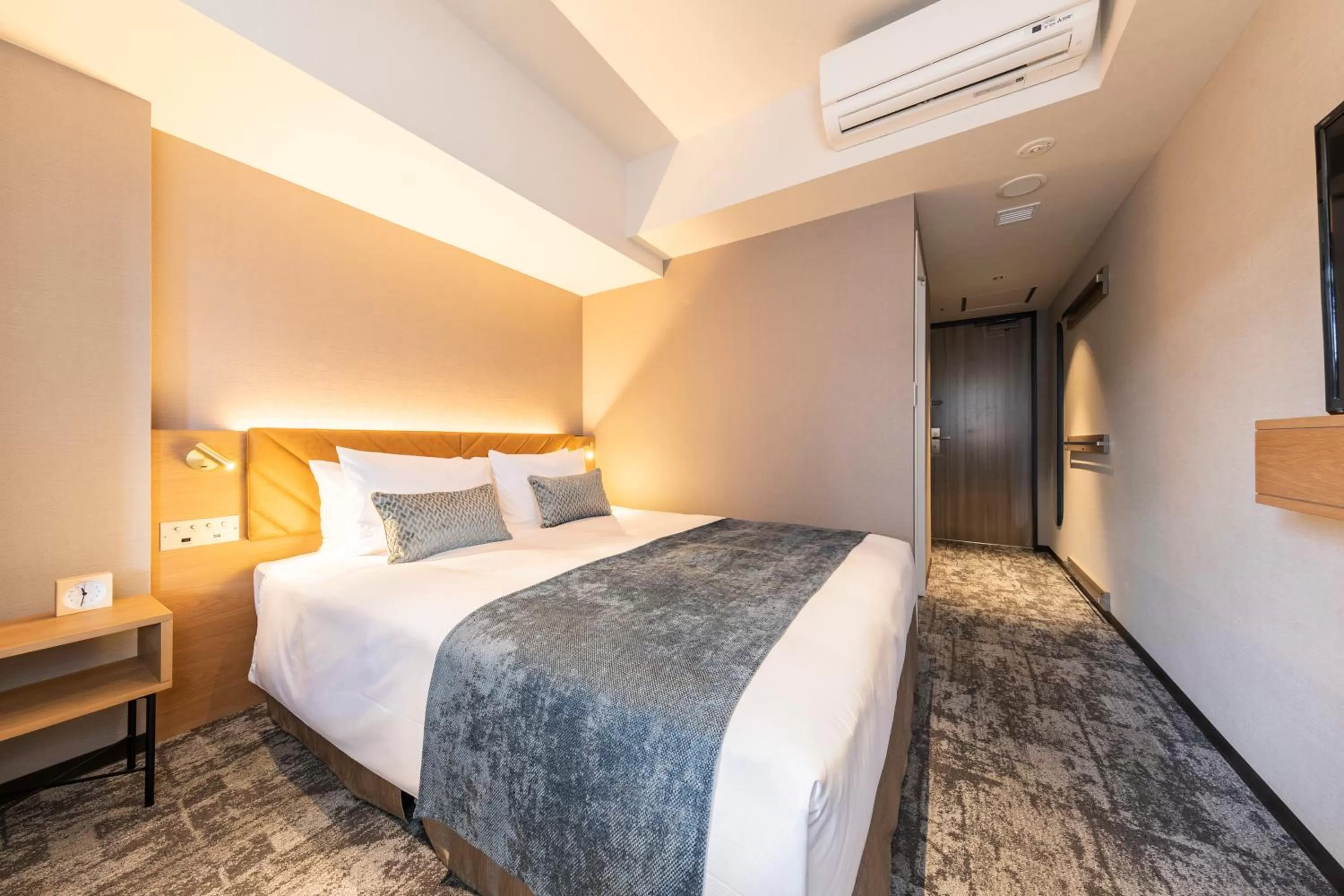 Bed in Tokyu Stay Hakodate Asaichi Akarinoyu