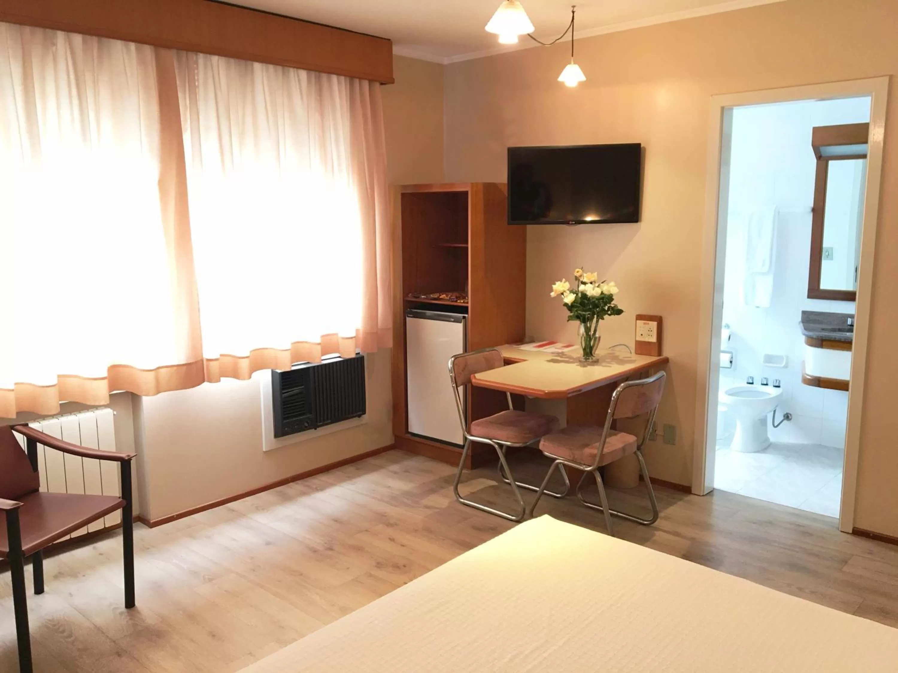 Seating area, TV/Entertainment Center in Cosmos Hotel