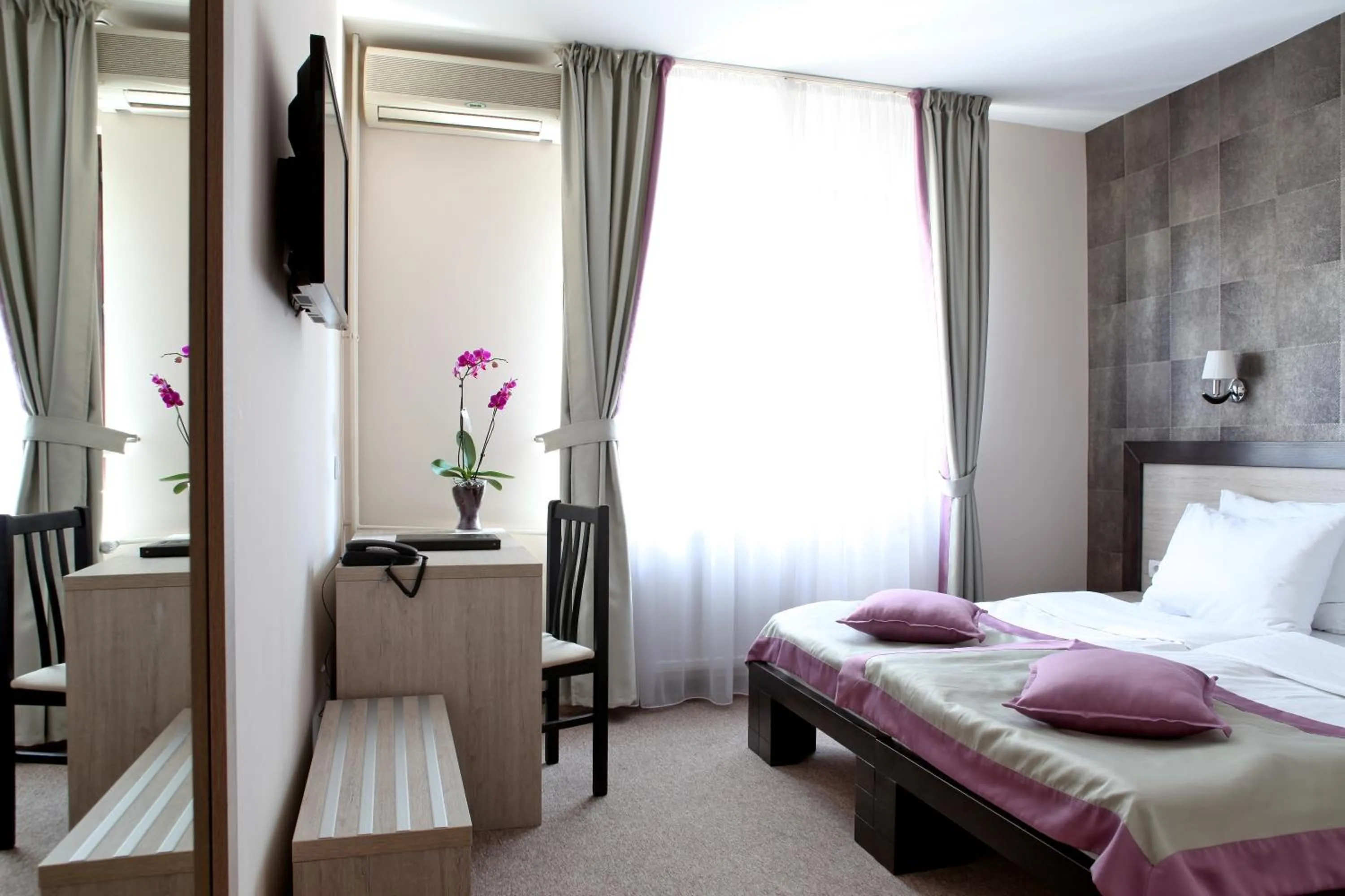 Bed in Garni Hotel Vozarev