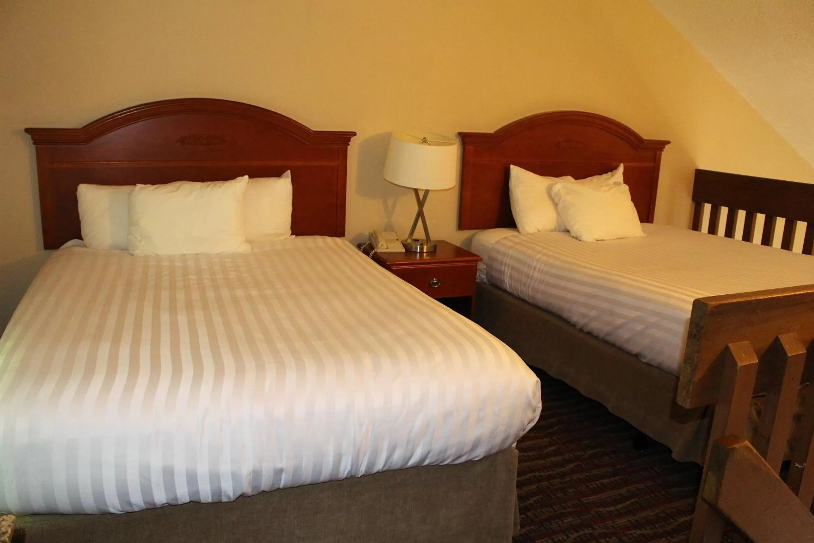 Bed in Ramada by Wyndham Campbell River