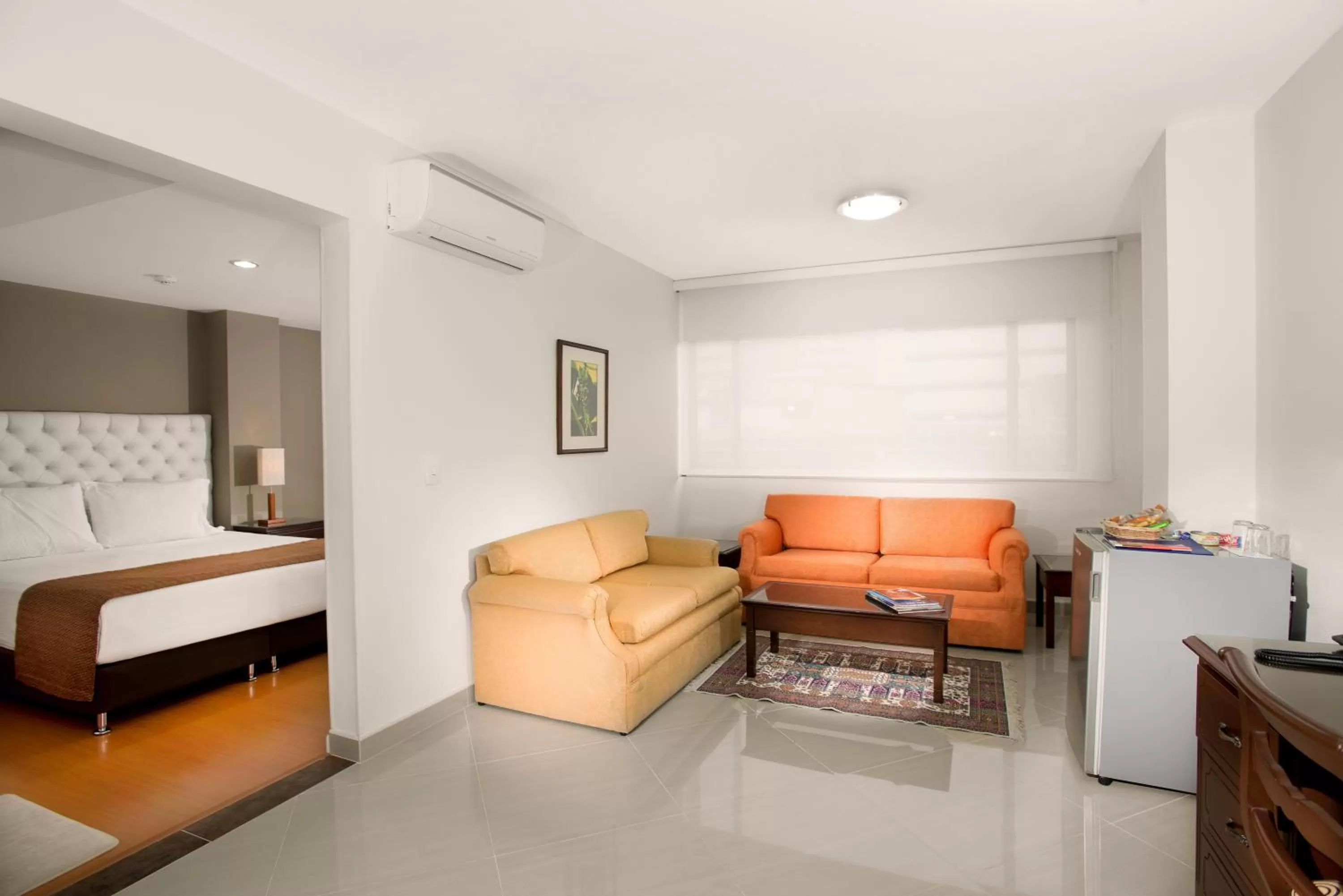 Seating area, Bed in Hotel Dann Combeima