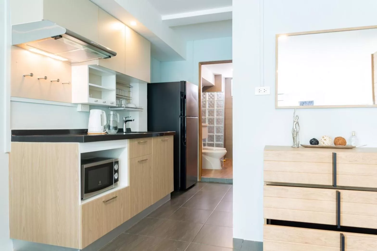 Kitchen or kitchenette in THE BEACH CHA AM Suites