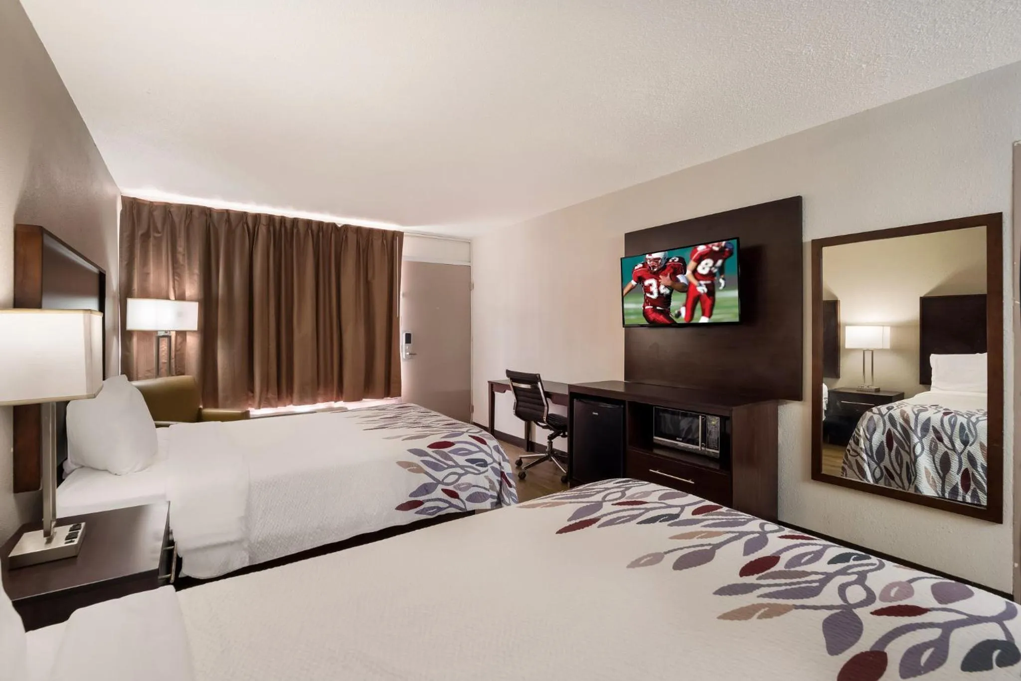 Photo of the whole room, Bed in Red Roof Inn Columbia, SC Airport