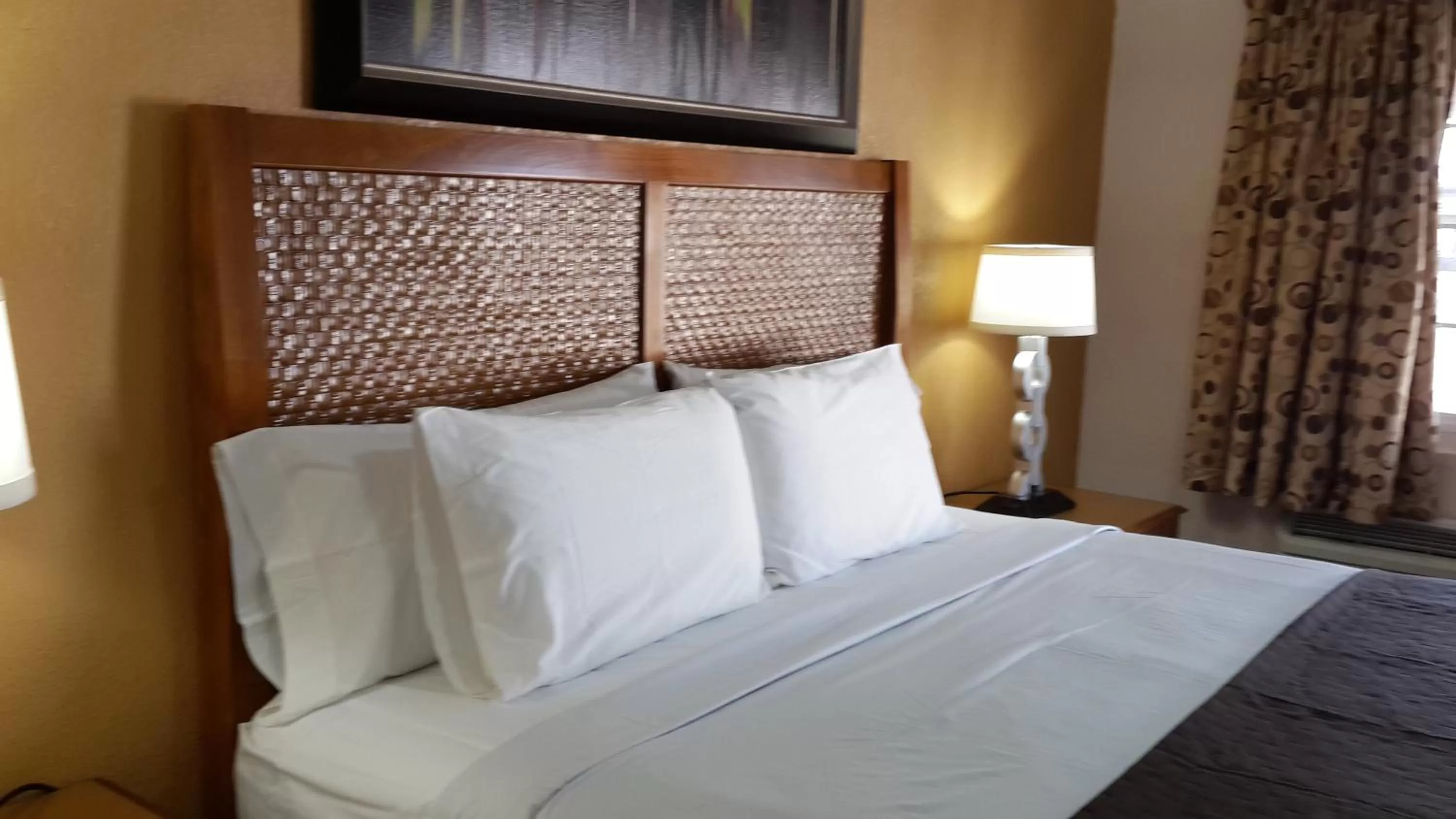 Bed in American Regency Inn