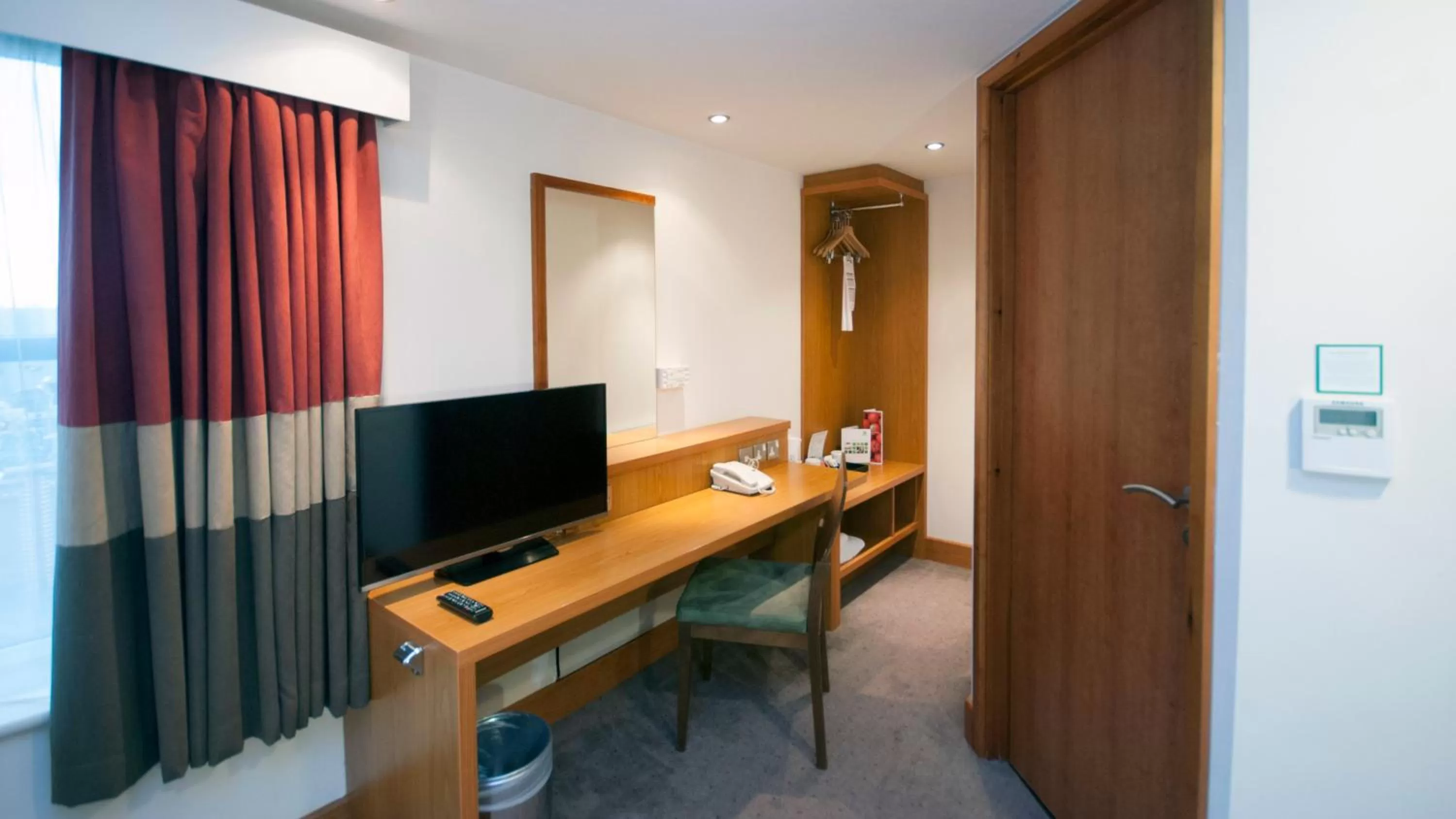 TV and multimedia, TV/Entertainment Center in Holiday Inn Manchester - Central Park, an IHG Hotel