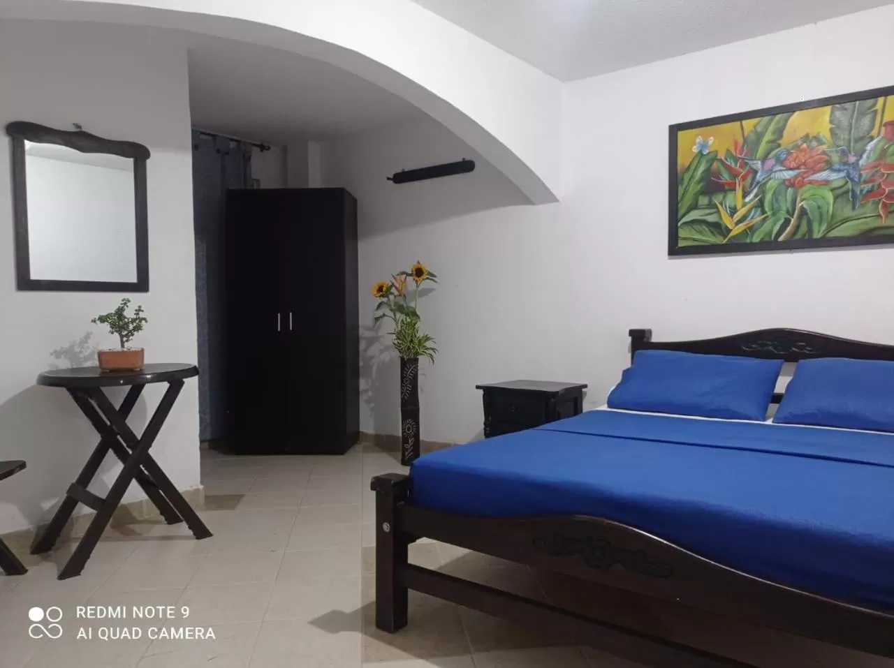 Communal lounge/ TV room, Bed in Hotel Plaza Calarcá