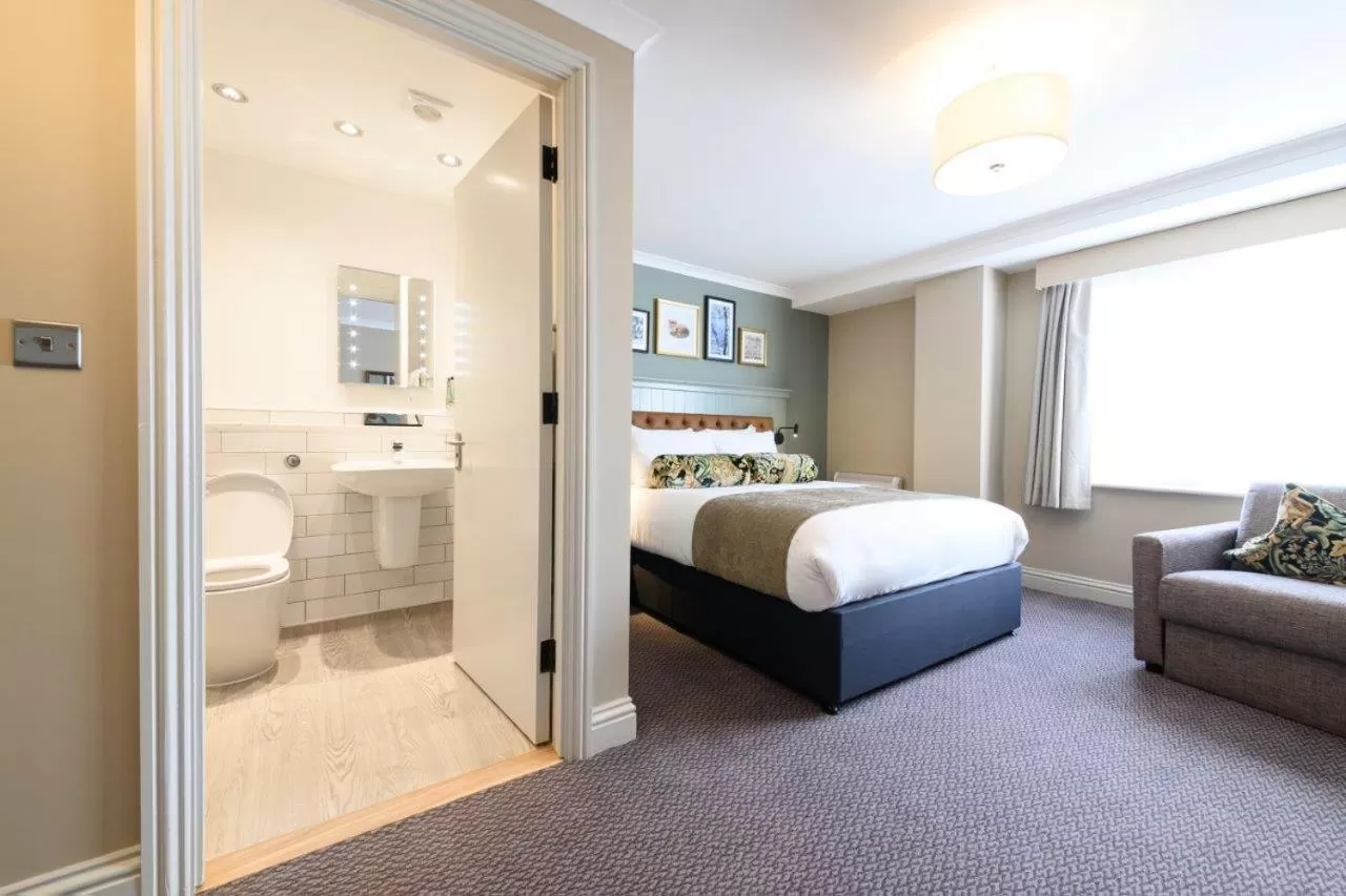 Bed in The St George and Dragon by Innkeeper's Collection