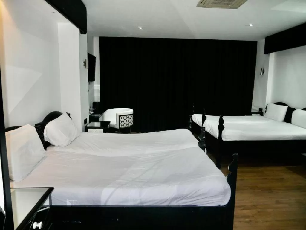 Bed in Print Works Hotel