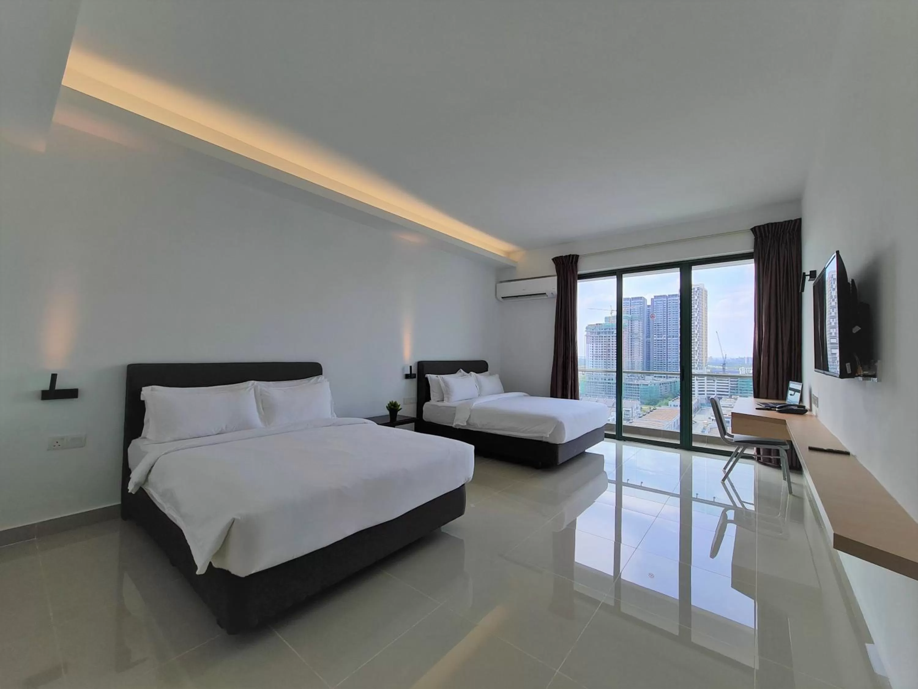 Bed in Swan Garden Resort Hotel