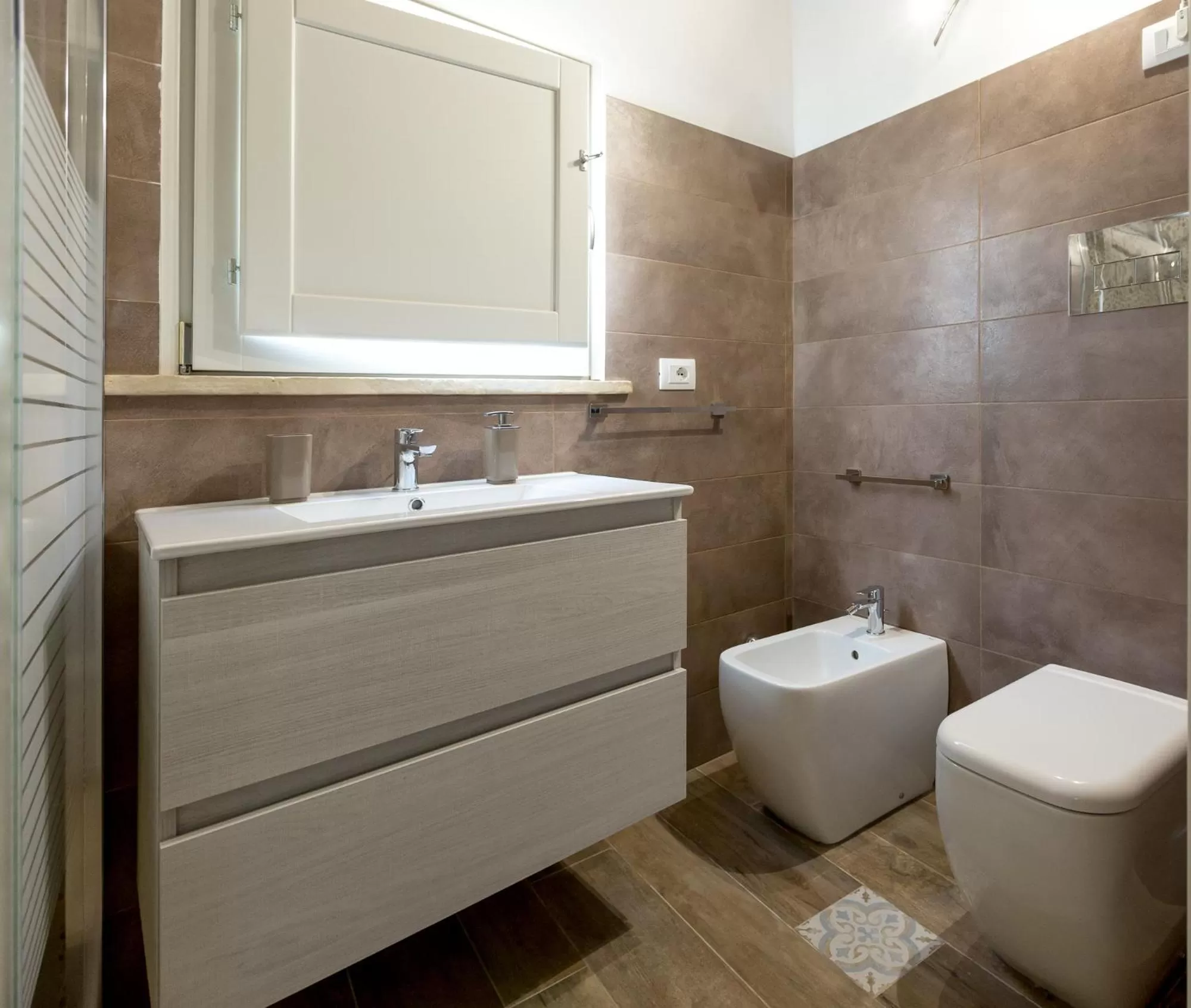 Toilet in Ortigia Boutique Palace