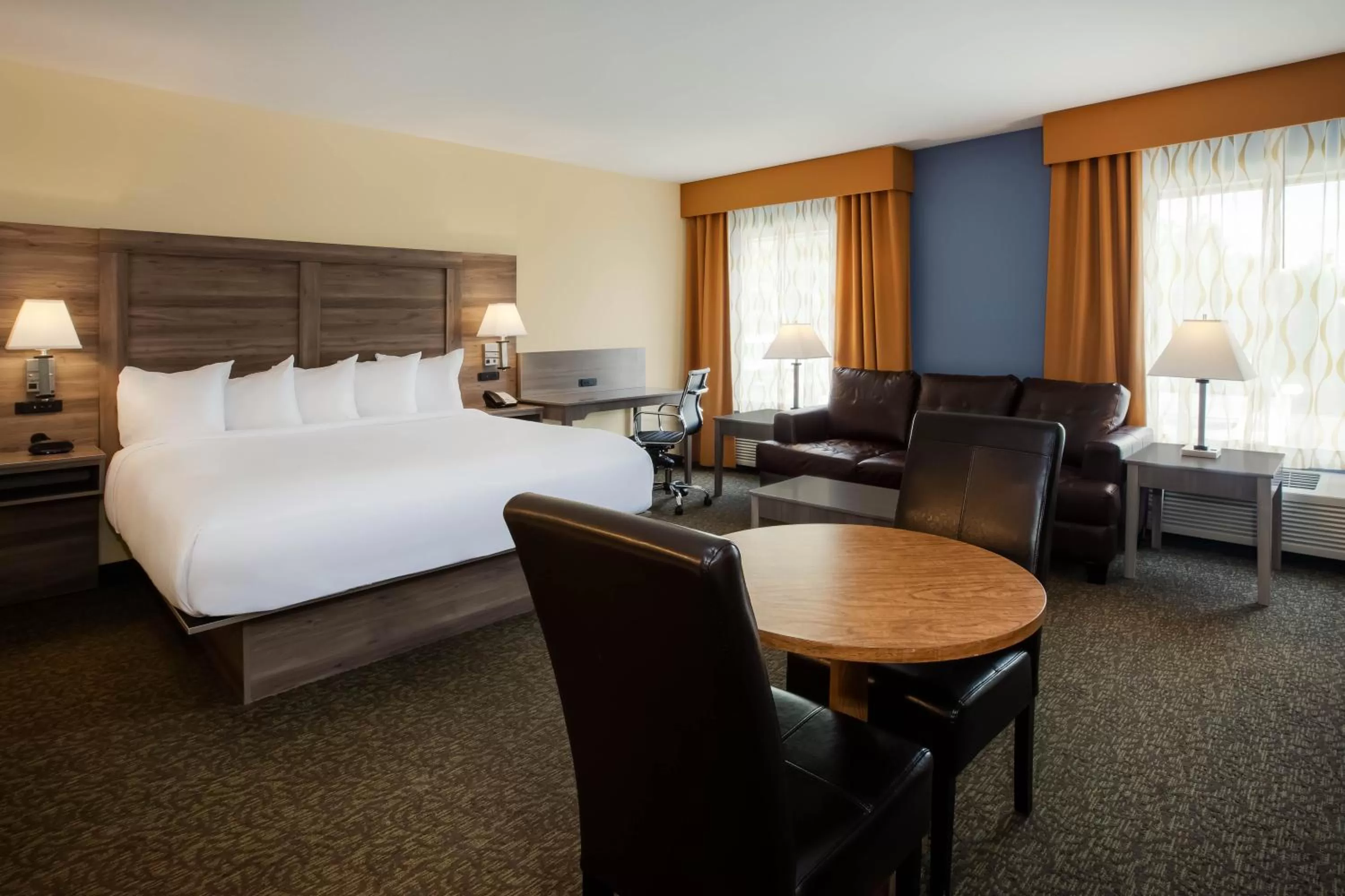 Bed in Days Inn by Wyndham Cadillac