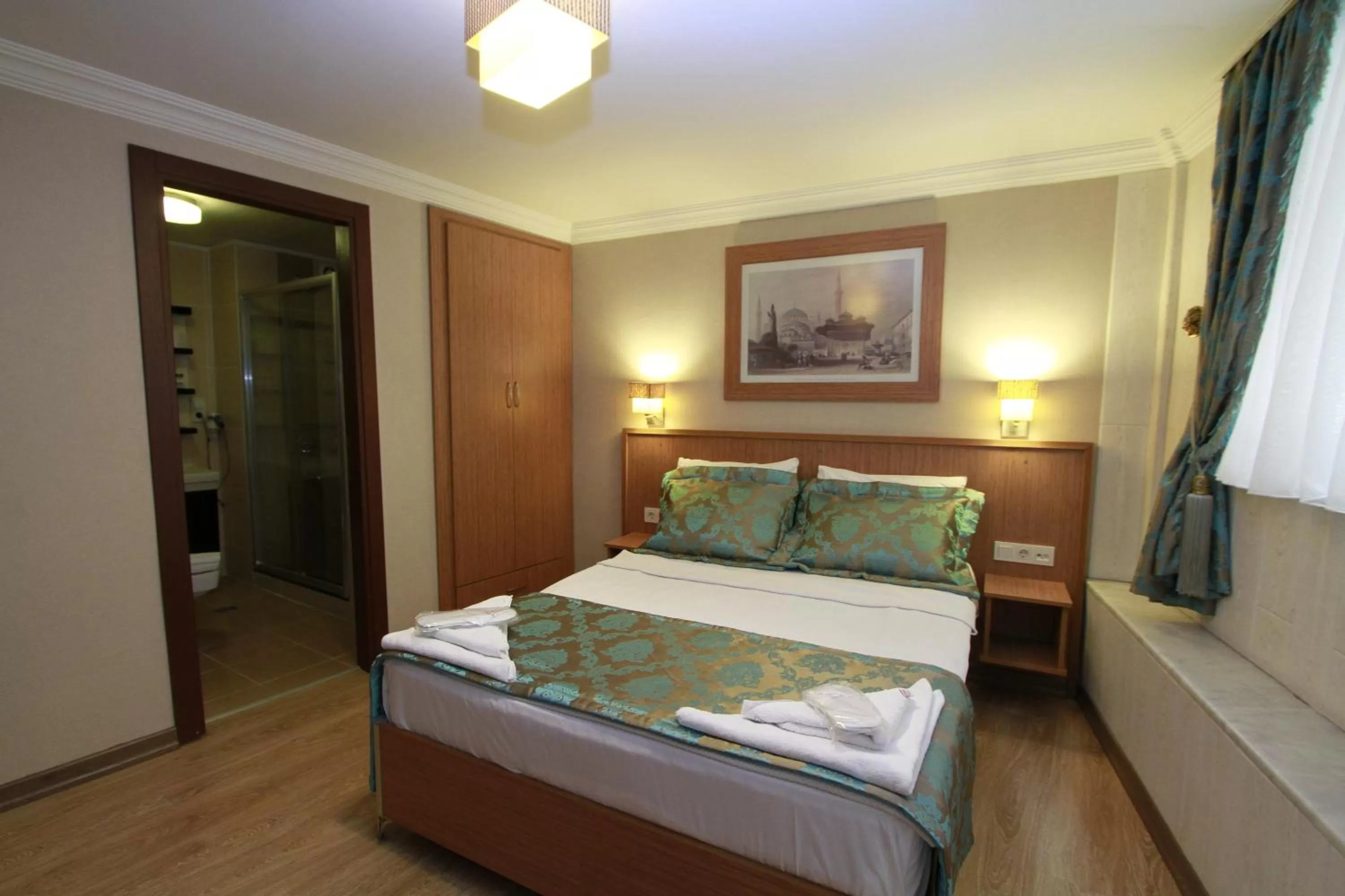 Bed in Agora Boutique Hotel & Bistro