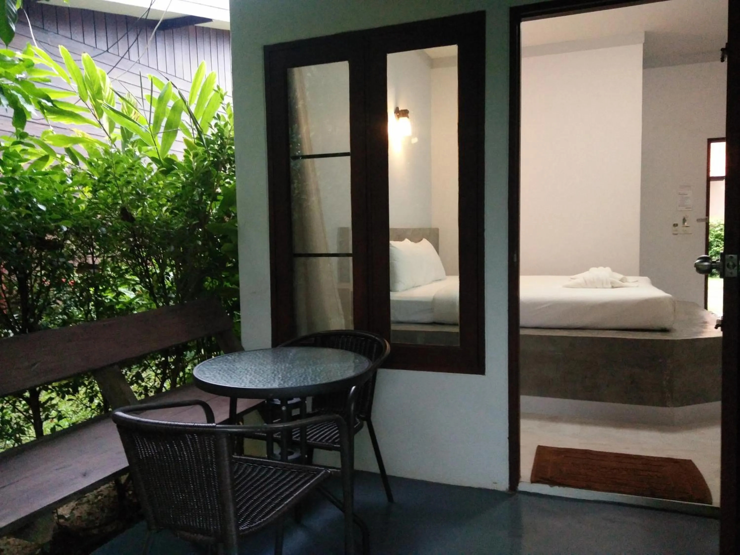 Bed in Baan Suan Rim Klong Resort