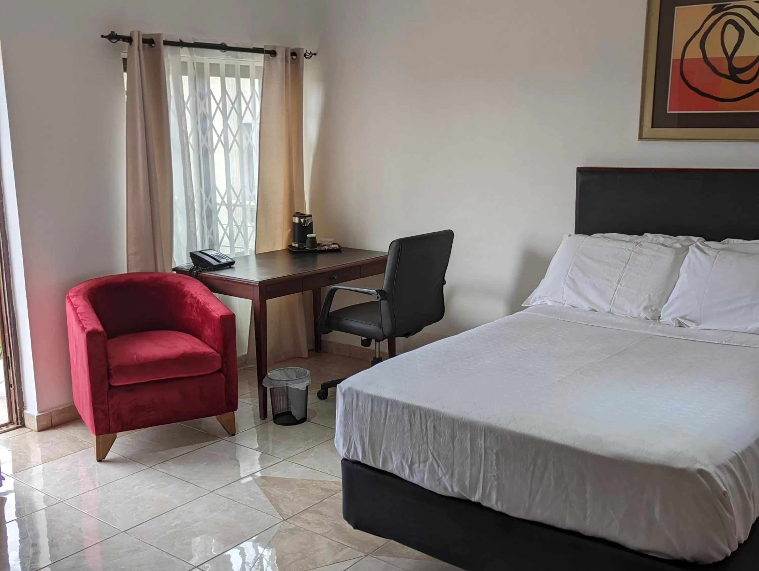 Bed in KoKo Palm Inn LTD