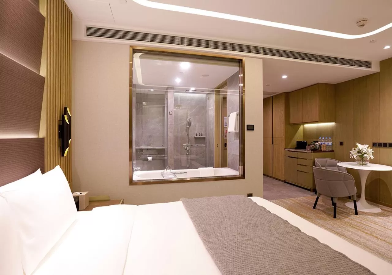 Bed in One-Eight-One Hotel & Serviced Residences