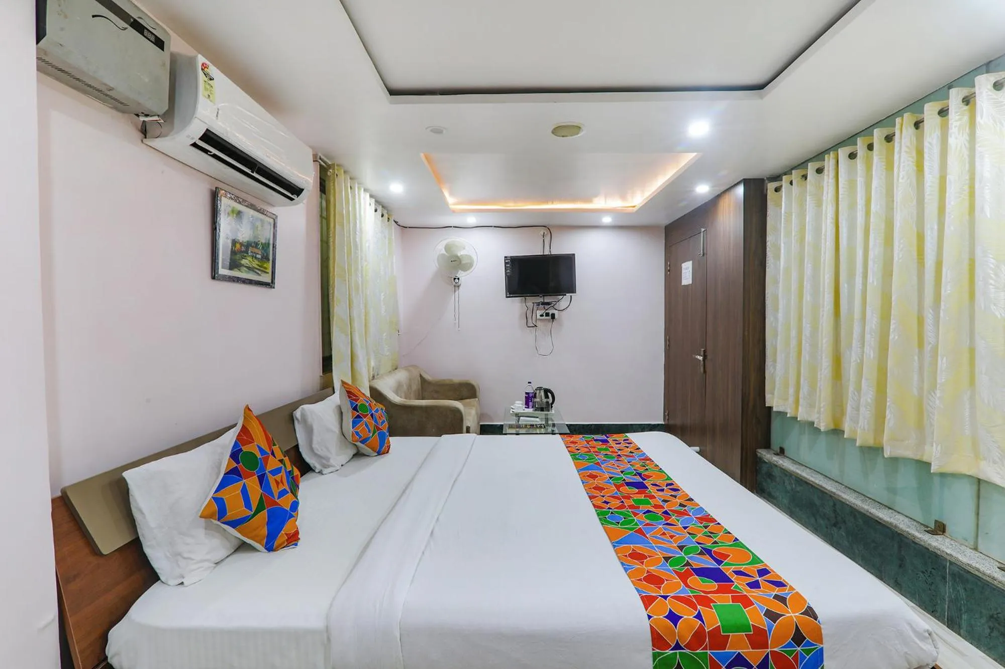 Bed in FabHotel Astor