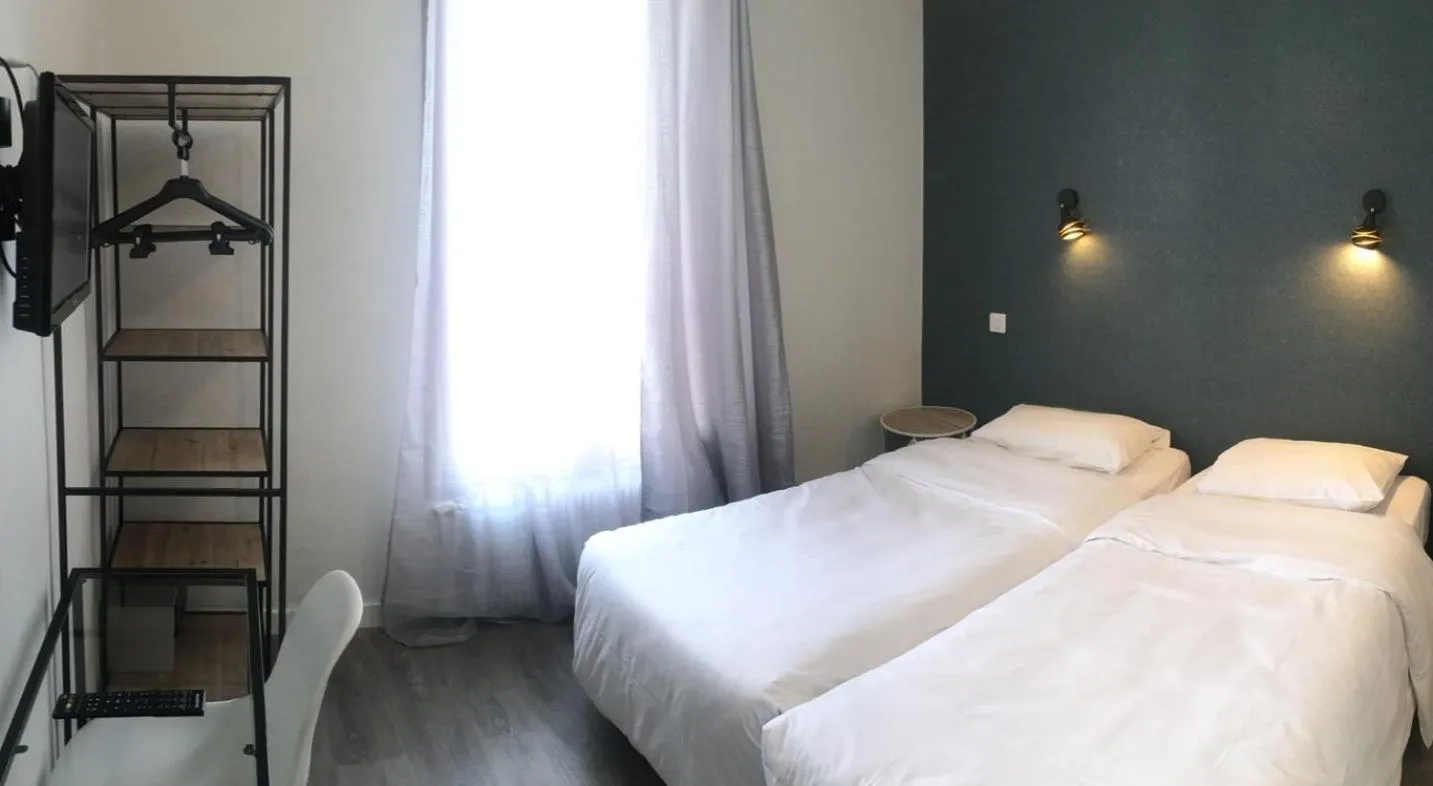 Photo of the whole room, Bed in Hôtel du Maine