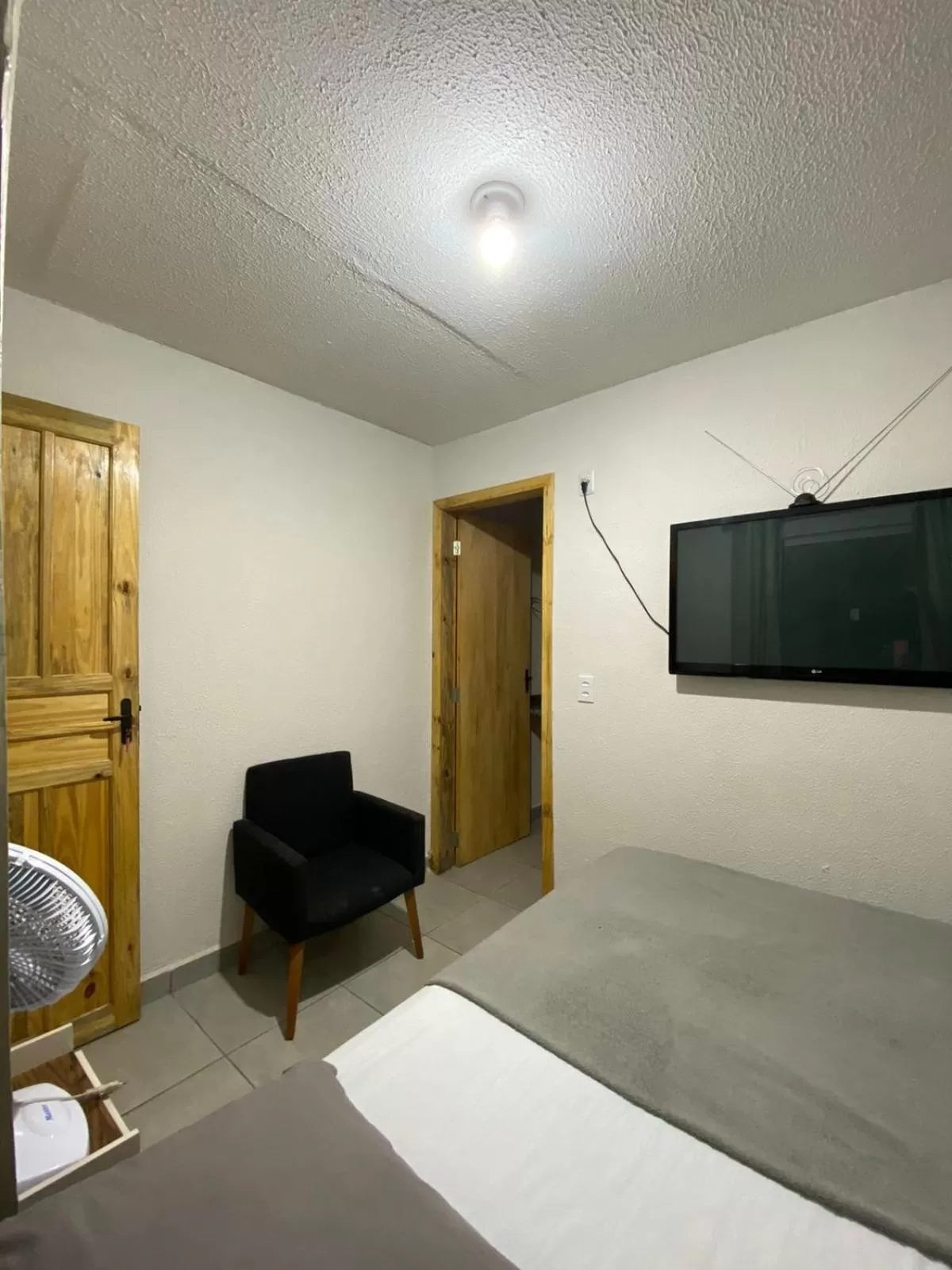 TV/Entertainment Center in Nova Pousada Consulado