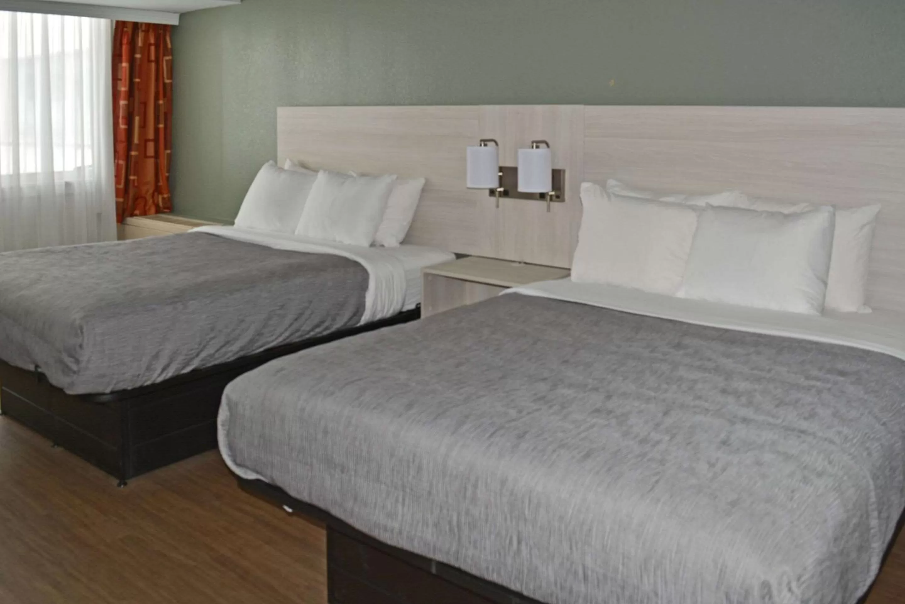 Bedroom, Bed in Quality Inn & Suites East Syracuse - Carrier Circle